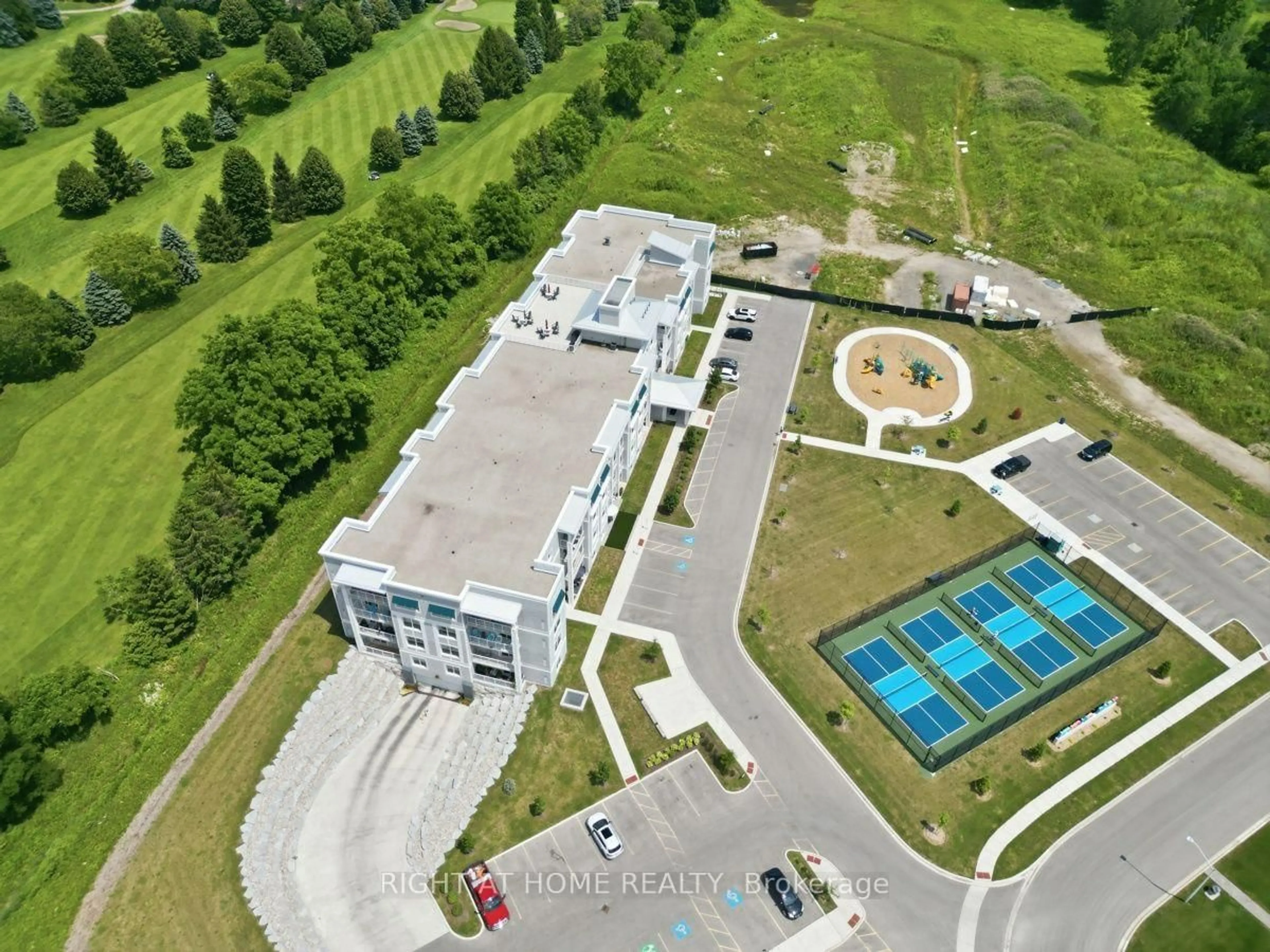 A pic from outside/outdoor area/front of a property/back of a property/a pic from drone, building for 100 The Prom #311, Central Elgin Ontario N5L 1C5