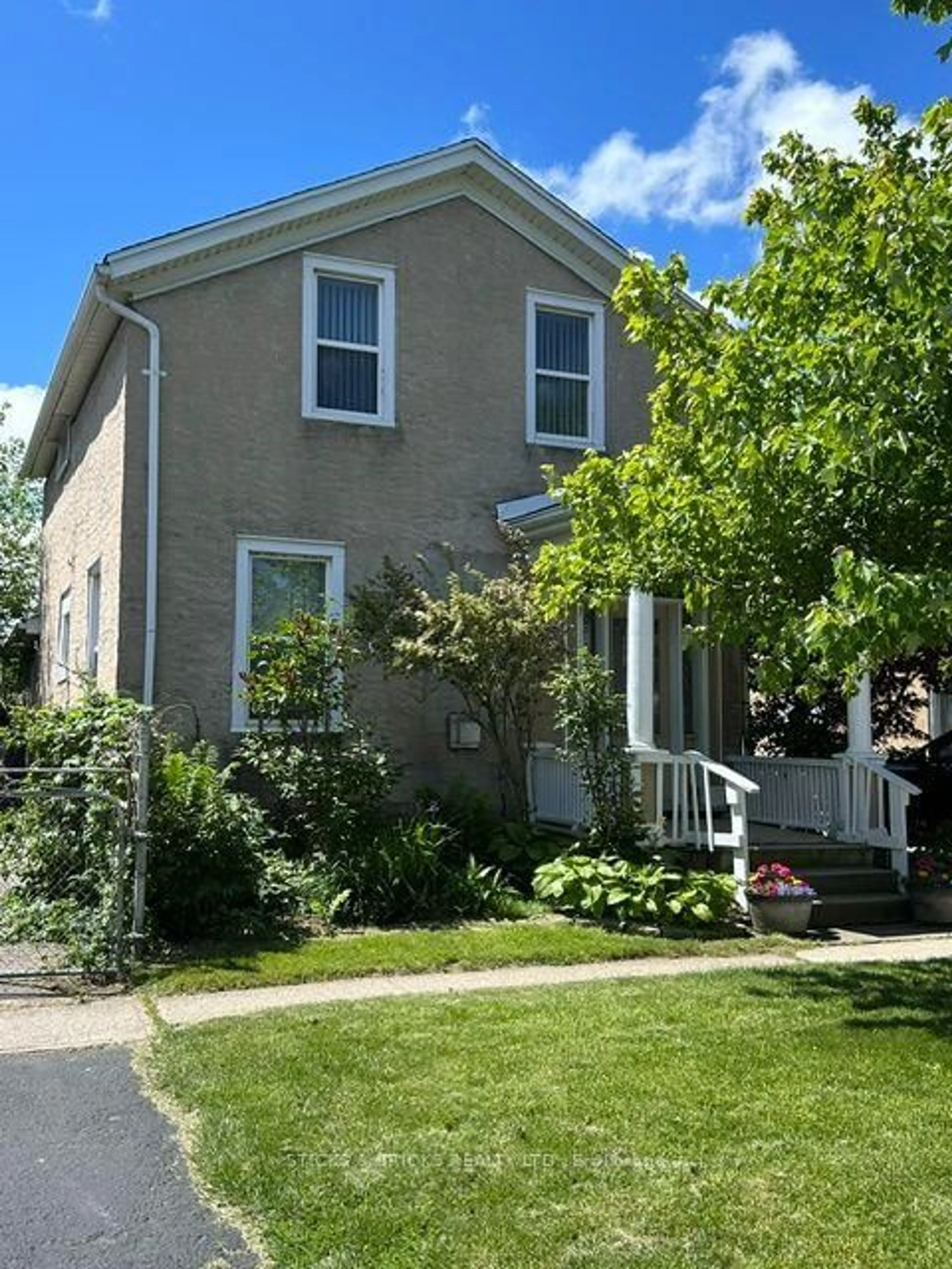 Home with vinyl exterior material, street for 12 Cross St, St. Catharines Ontario L2R 2W5
