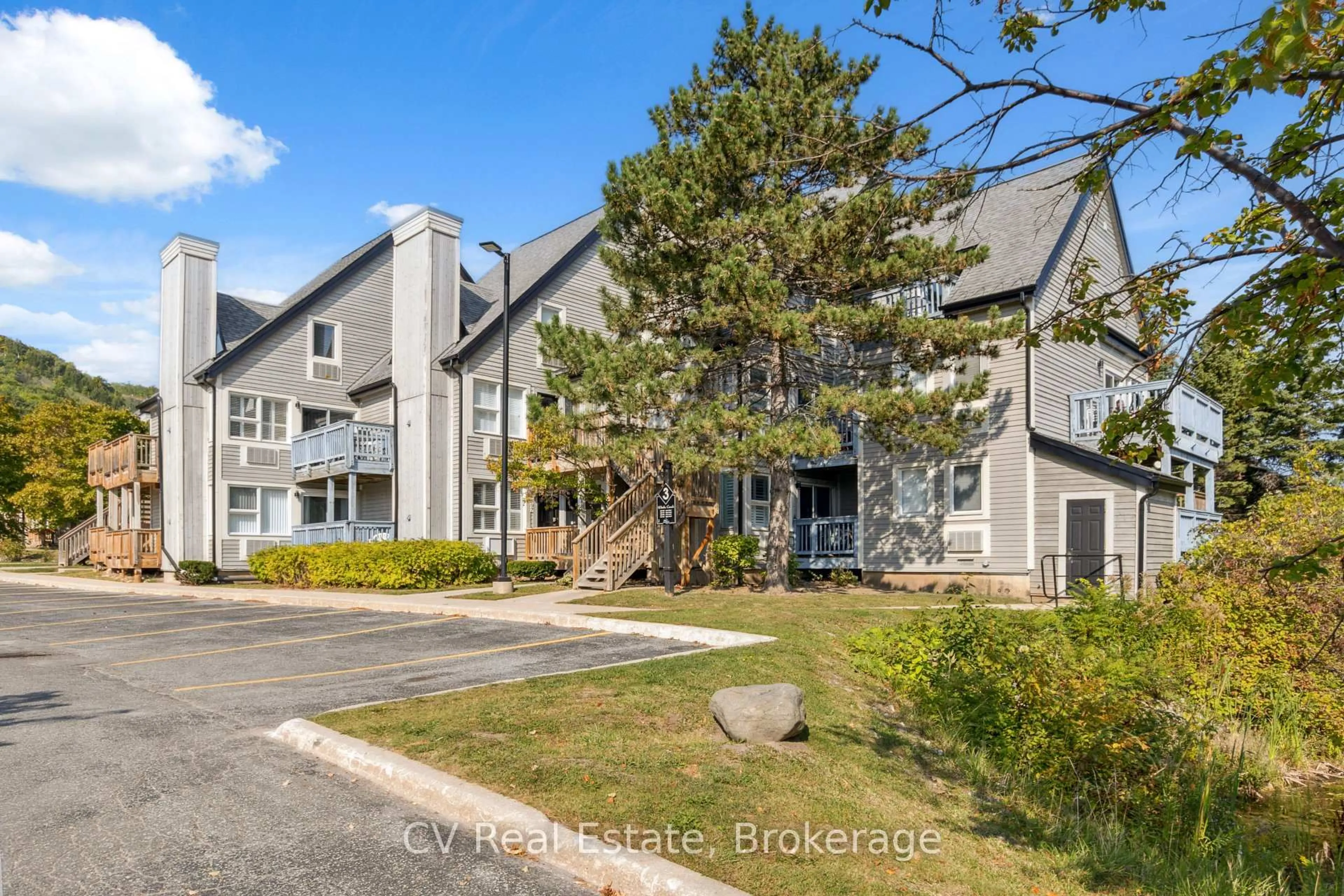 A pic from outside/outdoor area/front of a property/back of a property/a pic from drone, unknown for 796468 Grey 19 Rd #307, Blue Mountains Ontario L9Y 0N6