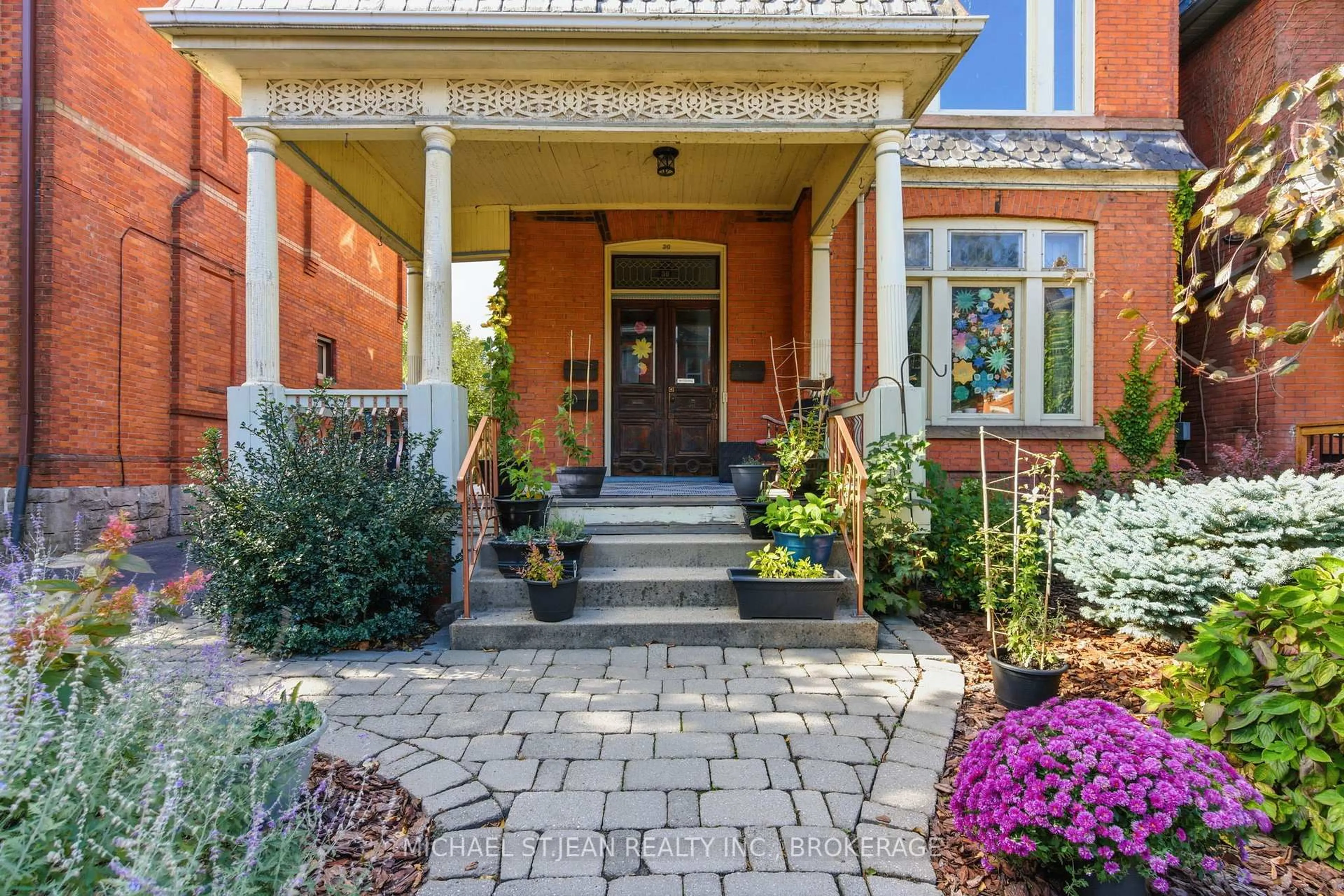 Home with brick exterior material, street for 30 Ontario Ave, Hamilton Ontario L8N 2X2
