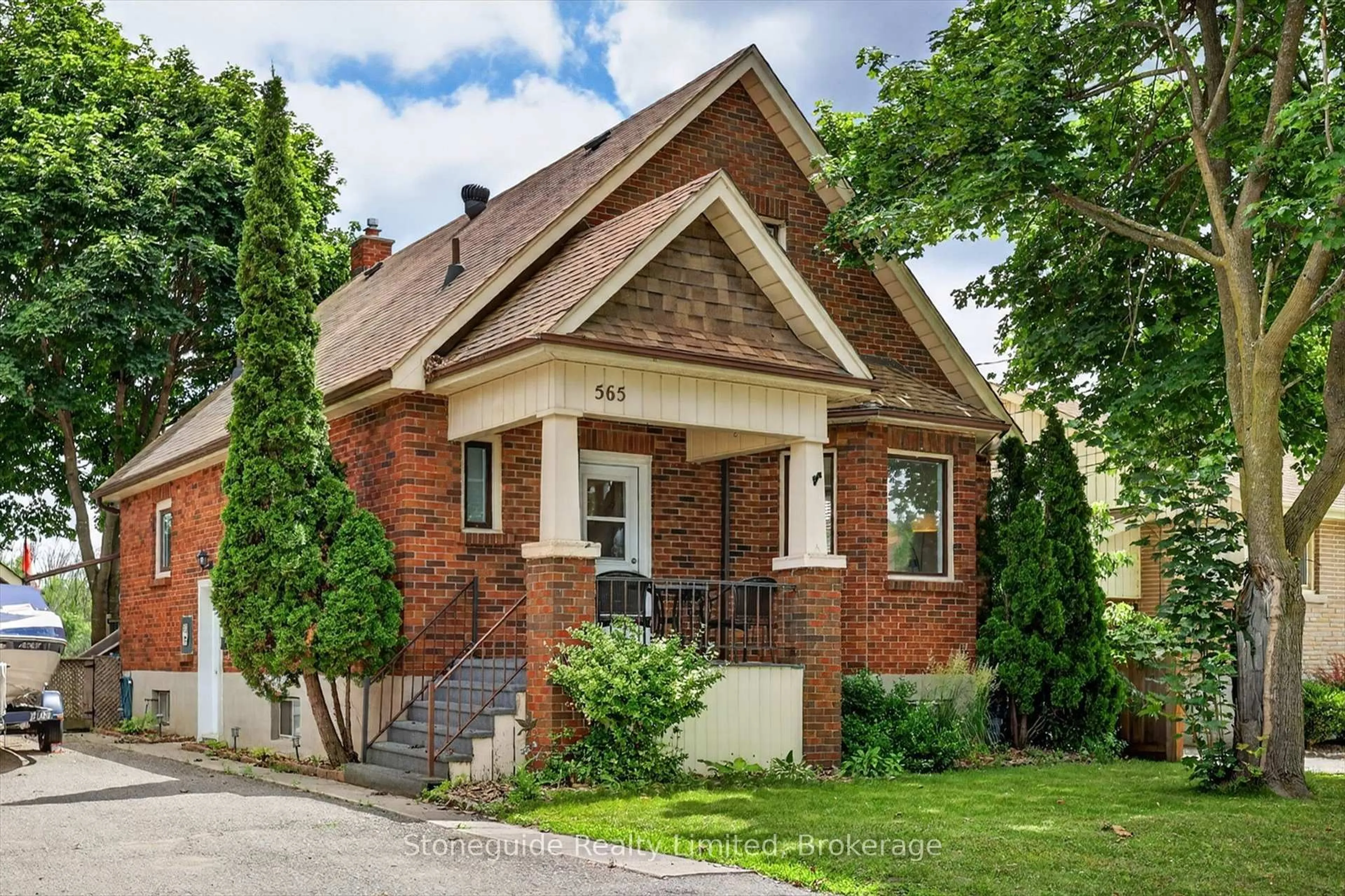 Home with brick exterior material, street for 565 Riverside Dr, Peterborough Ontario K9J 3Y9
