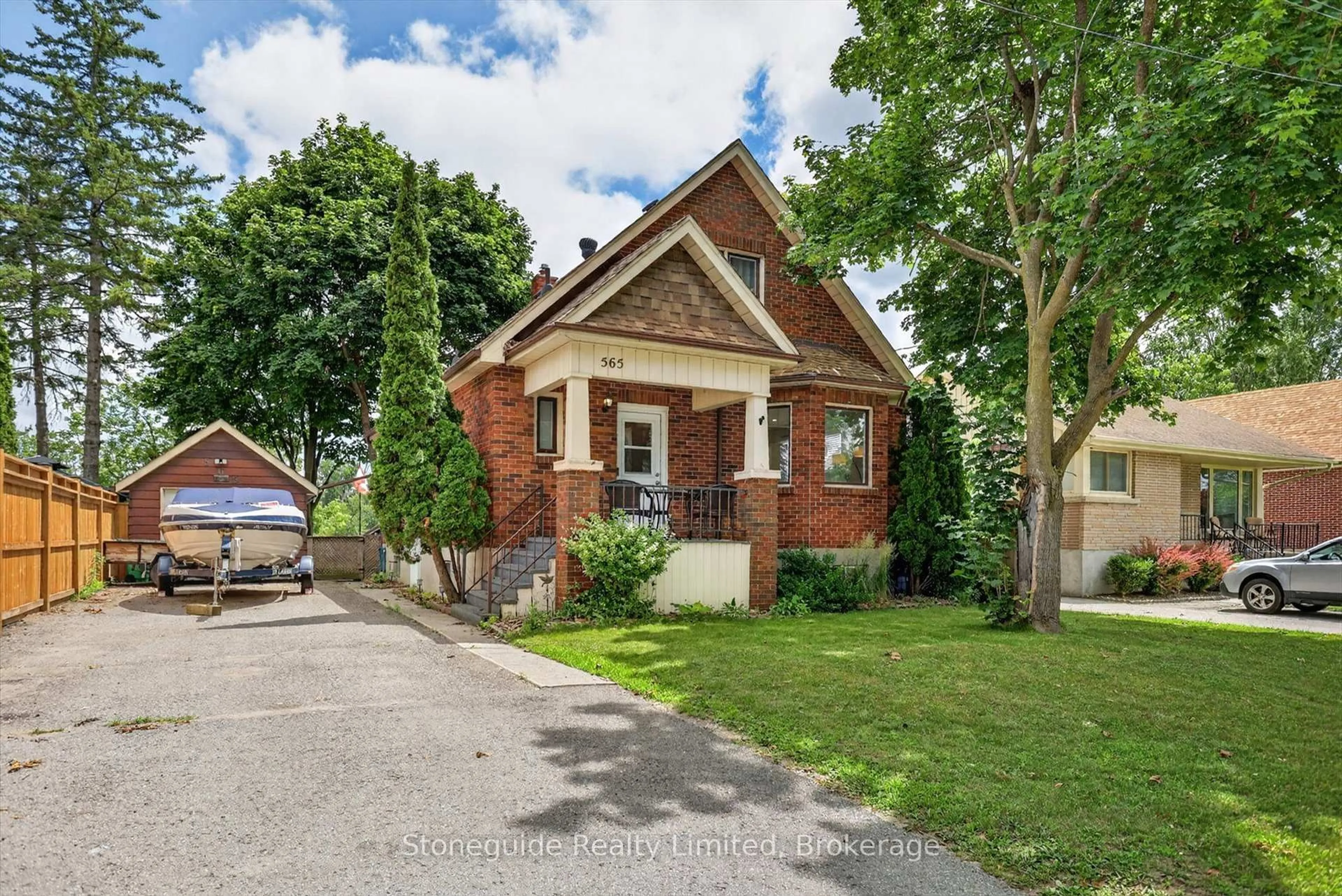 Home with brick exterior material, street for 565 Riverside Dr, Peterborough Ontario K9J 3Y9
