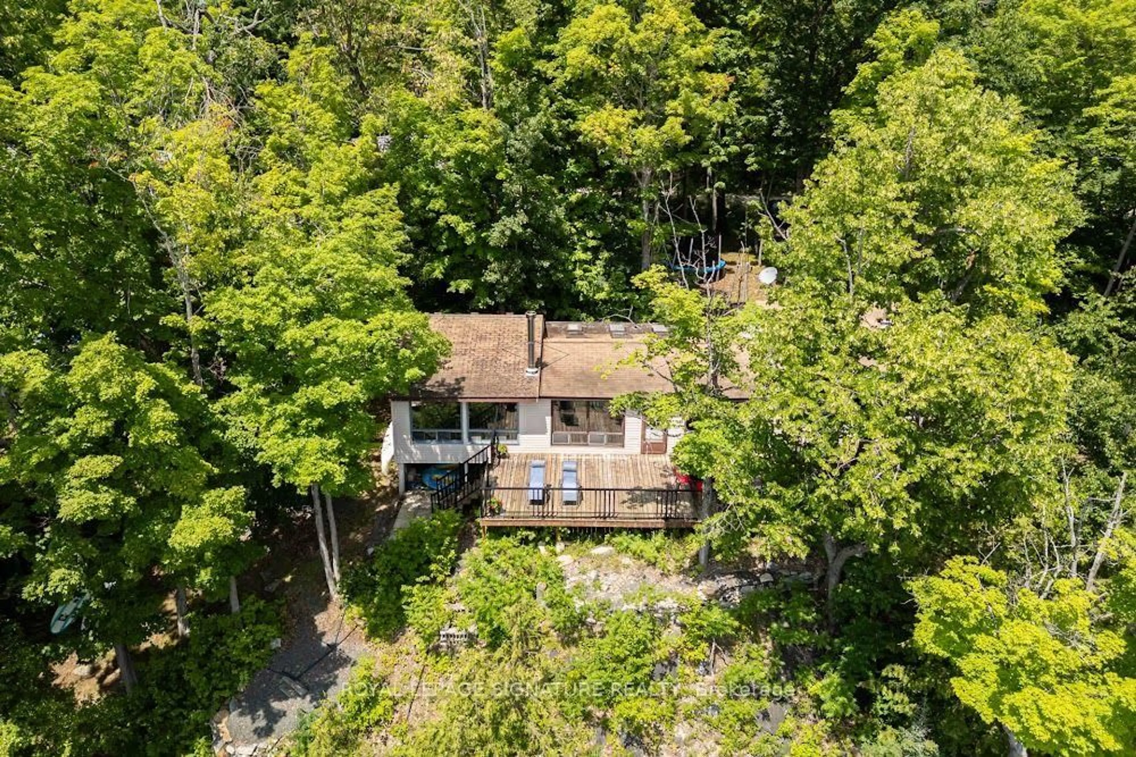A pic from outside/outdoor area/front of a property/back of a property/a pic from drone, forest/trees view for 383 Fire Route 59 Rte, Havelock-Belmont-Methuen Ontario K0L 1Z0