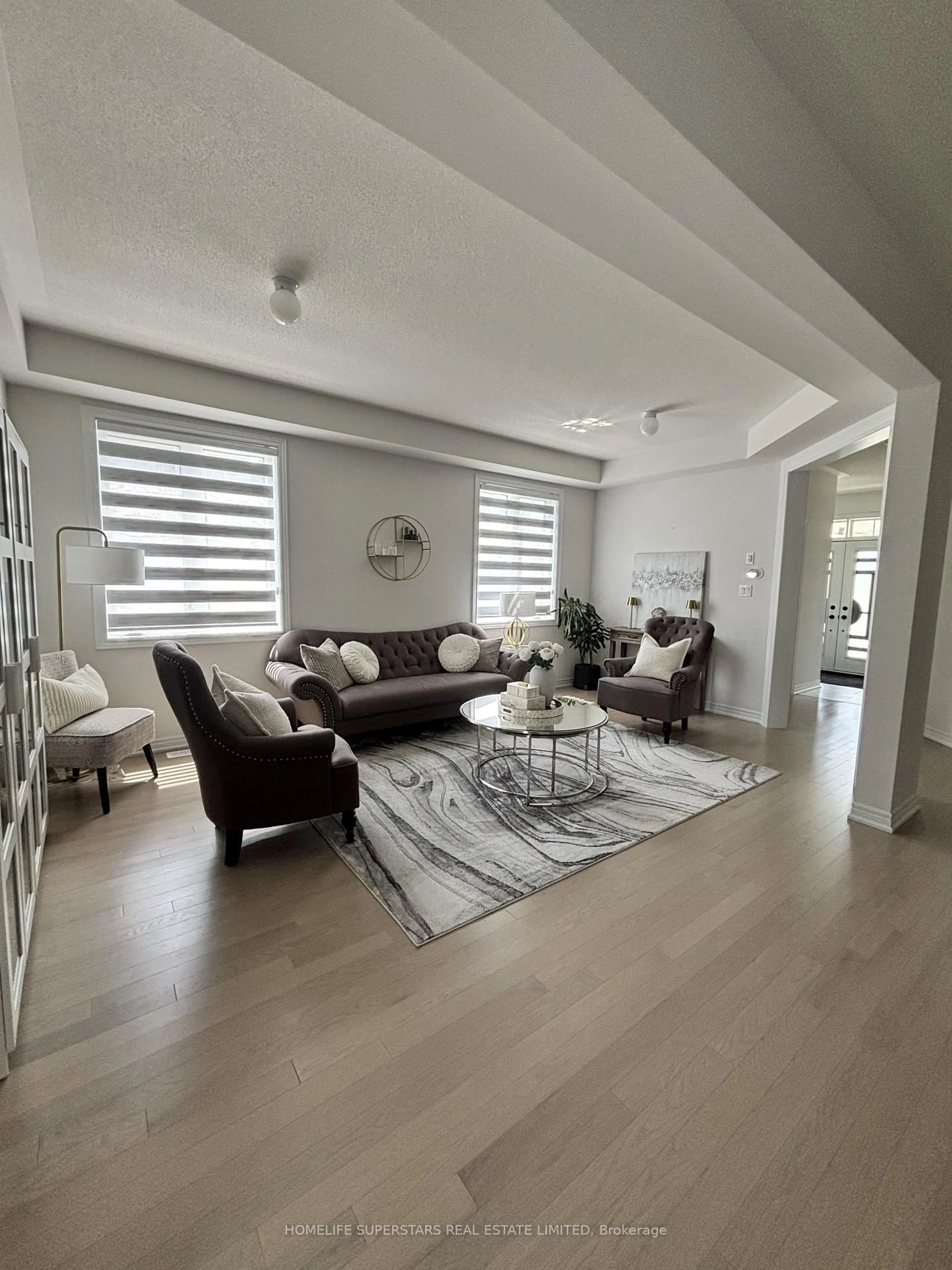 Living room with furniture, unknown for 435 Black Cherry Cres, Shelburne Ontario L9V 3Y7