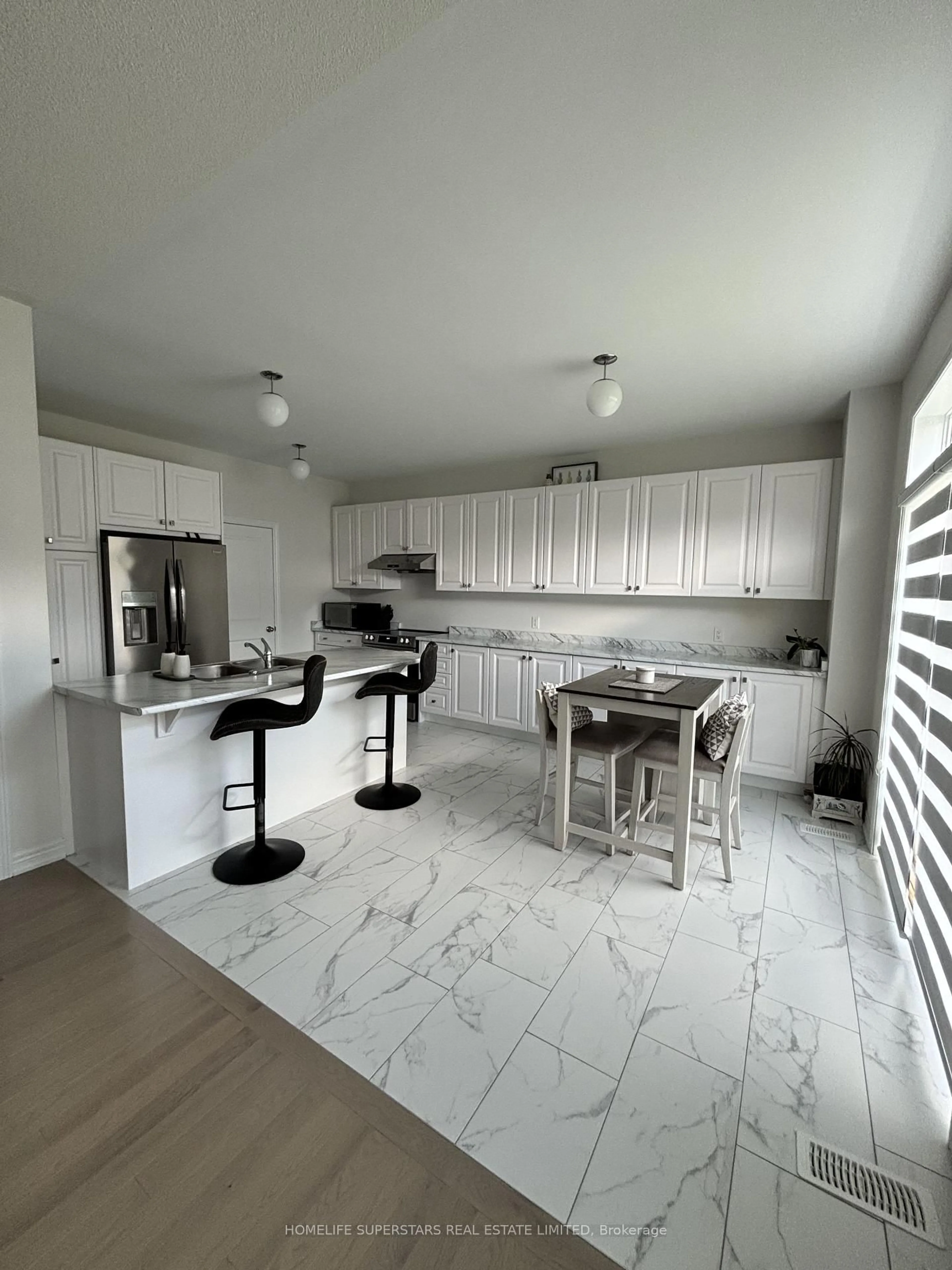 Open concept kitchen, ceramic/tile floor for 435 Black Cherry Cres, Shelburne Ontario L9V 3Y7