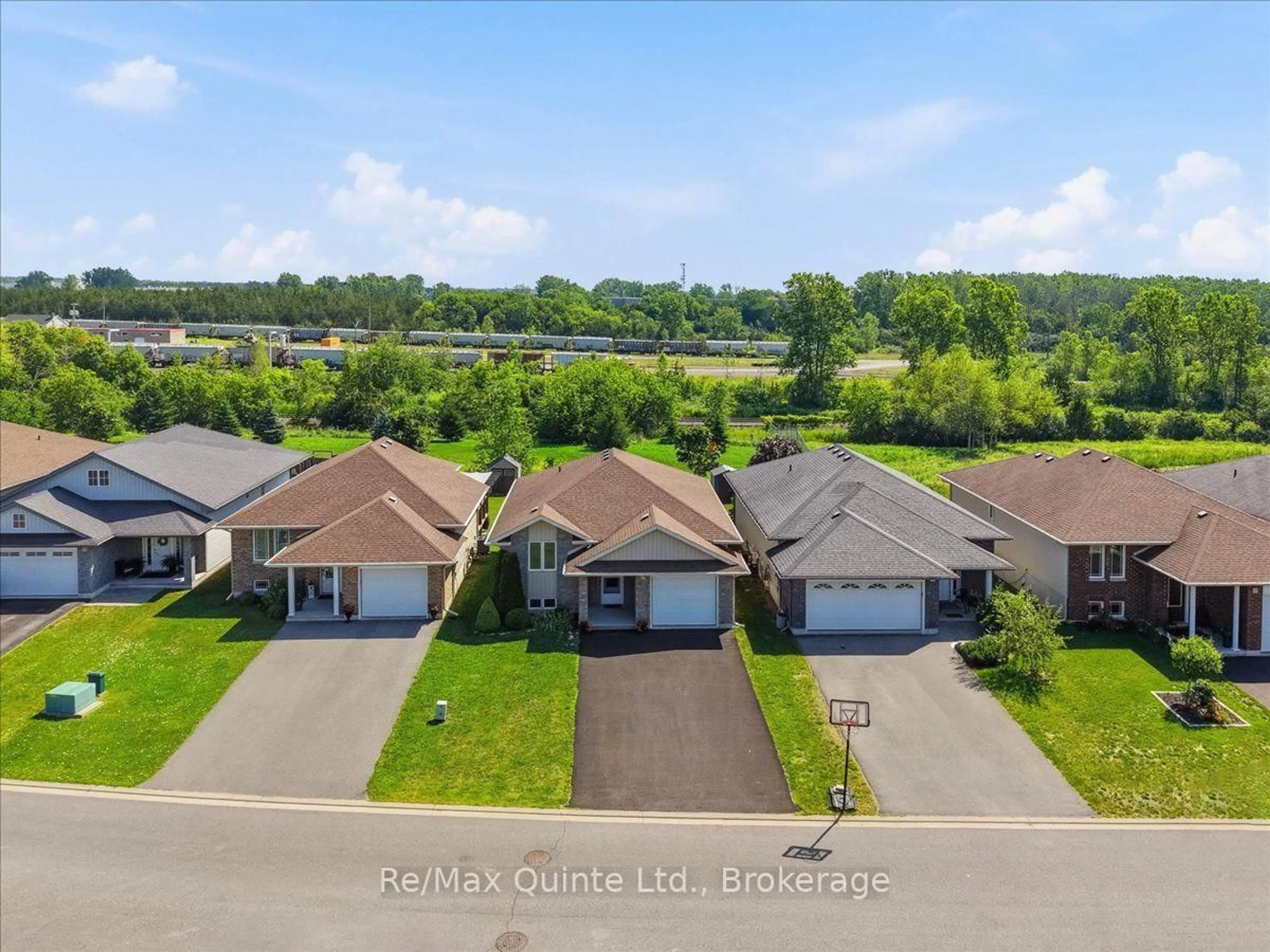 A pic from outside/outdoor area/front of a property/back of a property/a pic from drone, water/lake/river/ocean view for 119 Greenhill Lane, Belleville Ontario K8N 0C7