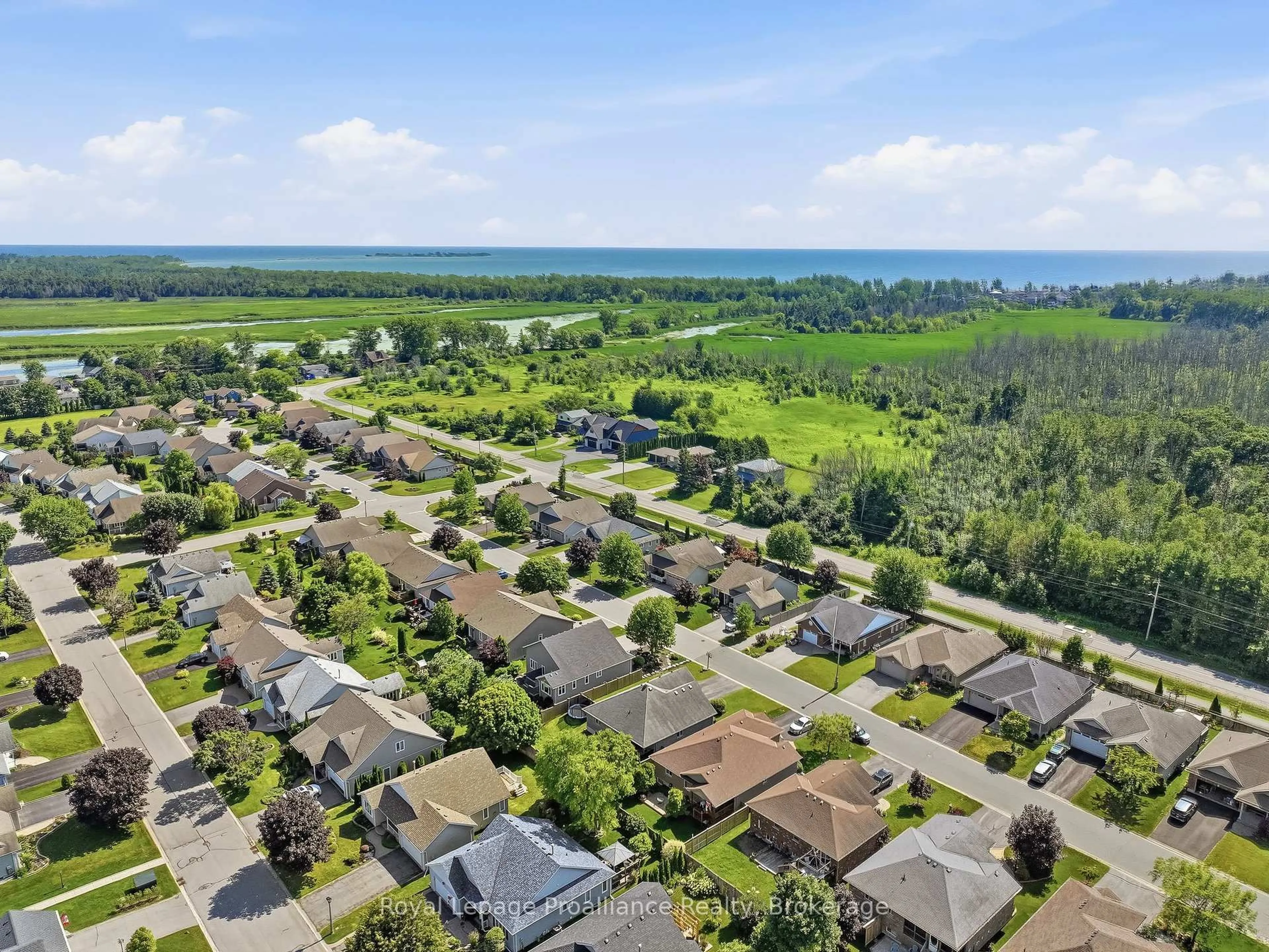A pic from outside/outdoor area/front of a property/back of a property/a pic from drone, water/lake/river/ocean view for 35 Ward Dr, Brighton Ontario K0K 1H0