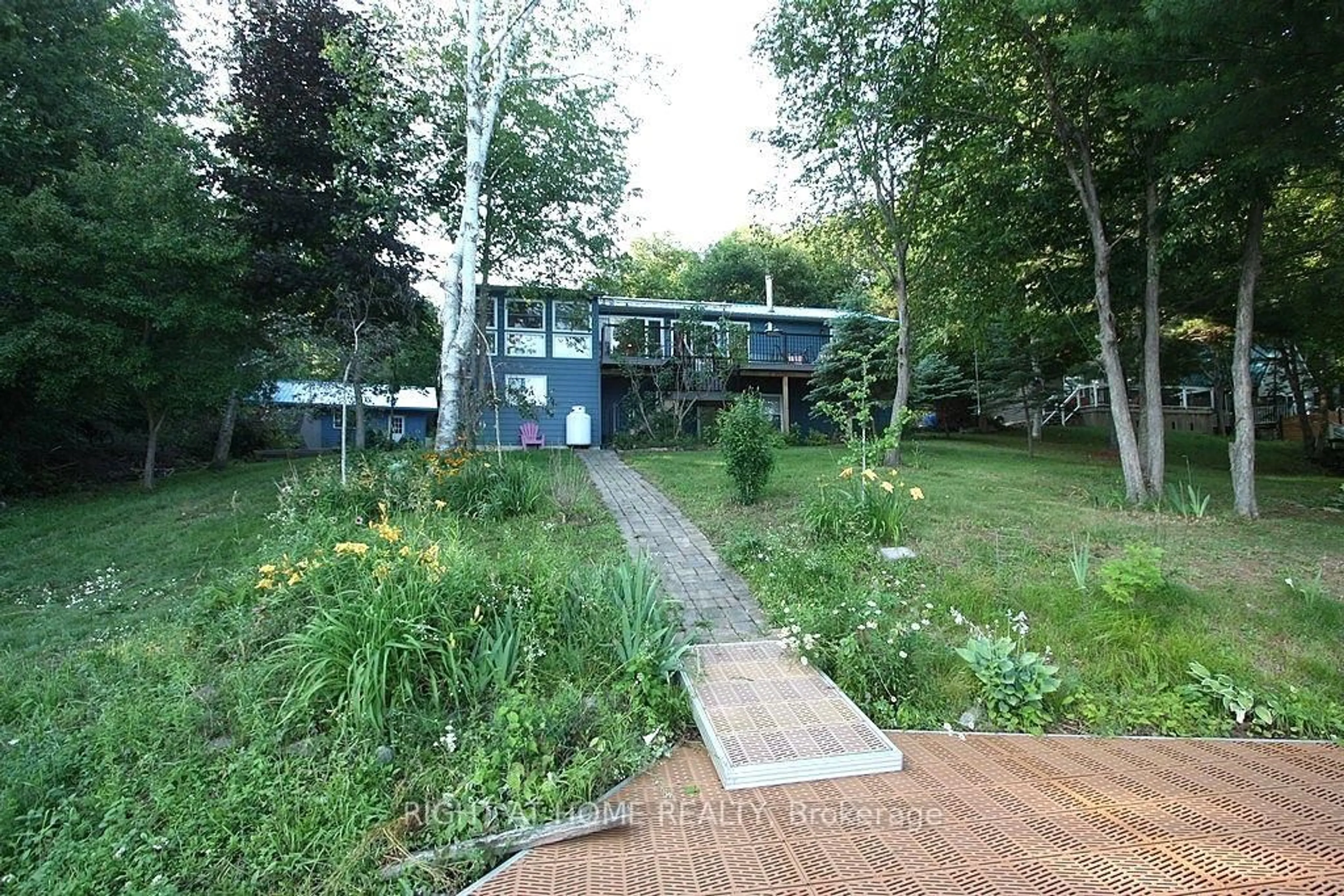 A pic from outside/outdoor area/front of a property/back of a property/a pic from drone, forest/trees view for 68 Scott Lane, Rideau Lakes Ontario K0G 1V0