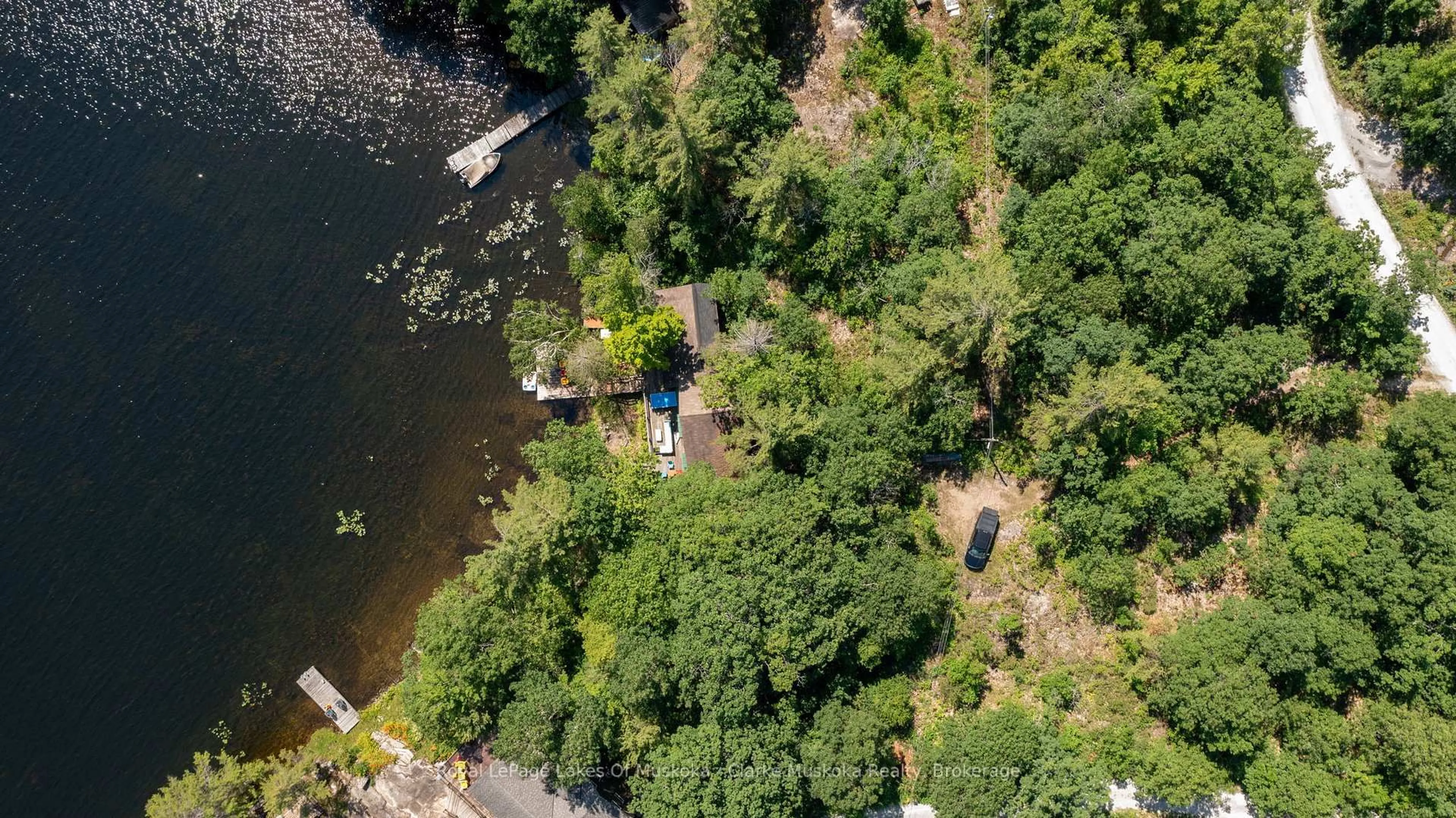 A pic from outside/outdoor area/front of a property/back of a property/a pic from drone, water/lake/river/ocean view for 21 Big Rock Rd, Georgian Bay Ontario L0K 1S0