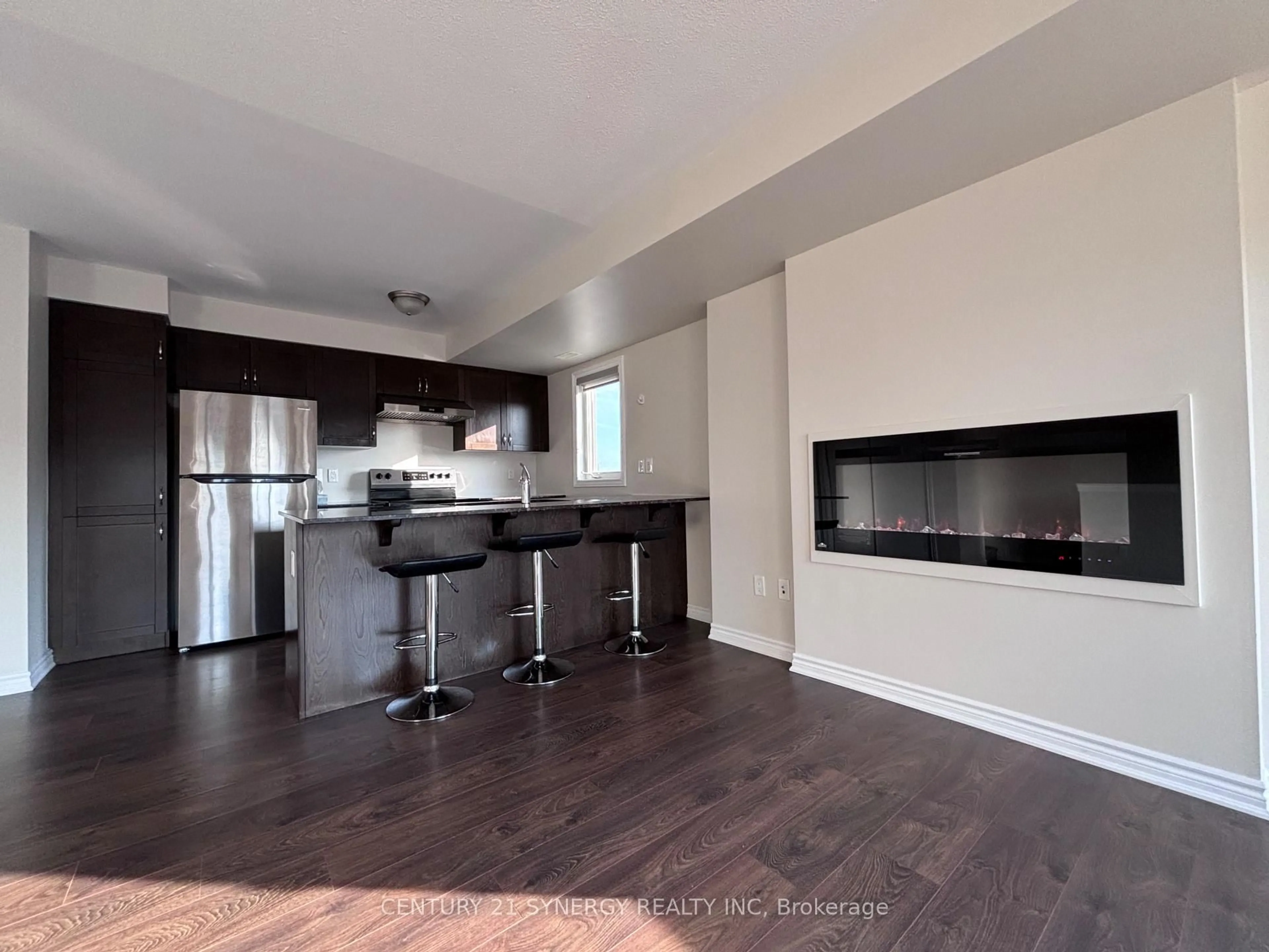 Open concept kitchen, wood/laminate floor for 2240 Watercolours Way, Ottawa Ontario K2J 6L3