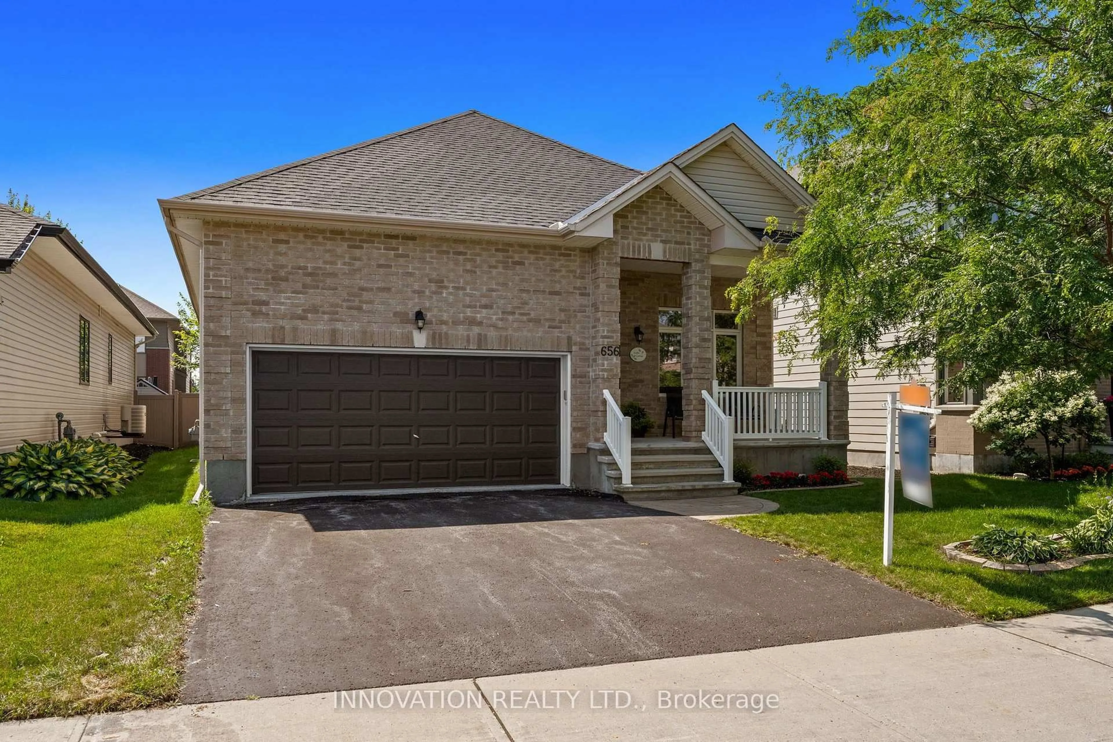 Home with brick exterior material, street for 656 Bridleglen Cres, Ottawa Ontario K2M 0H2
