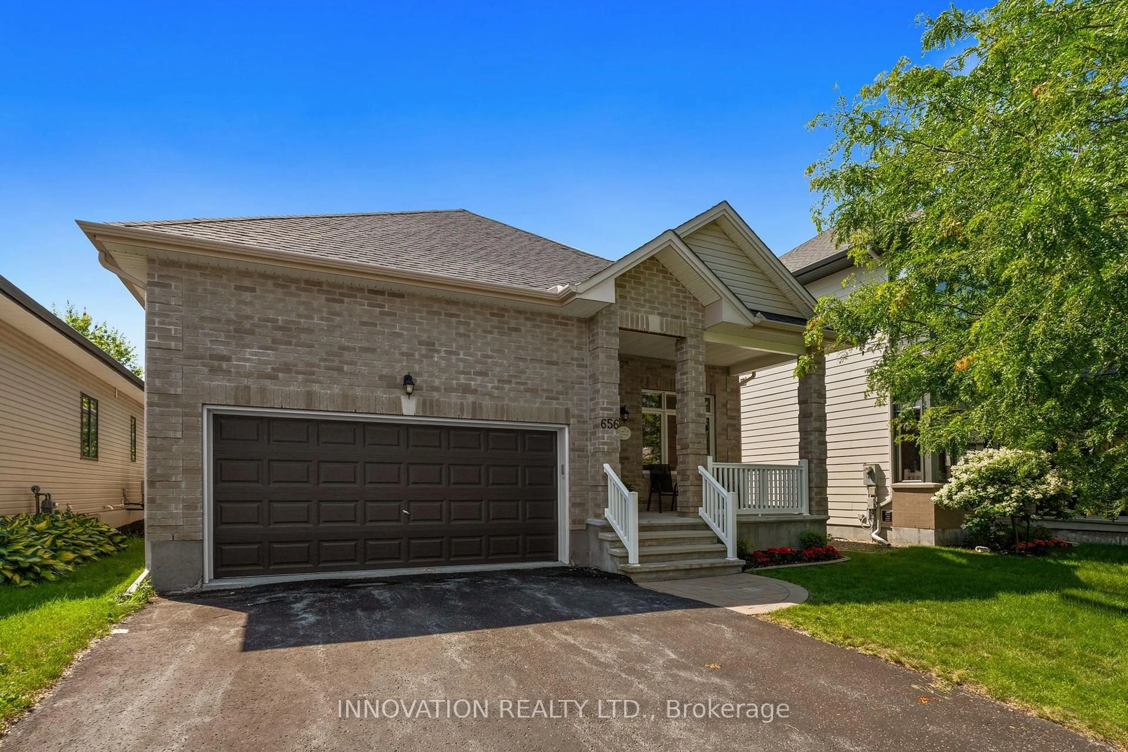 Home with brick exterior material, street for 656 Bridleglen Cres, Ottawa Ontario K2M 0H2