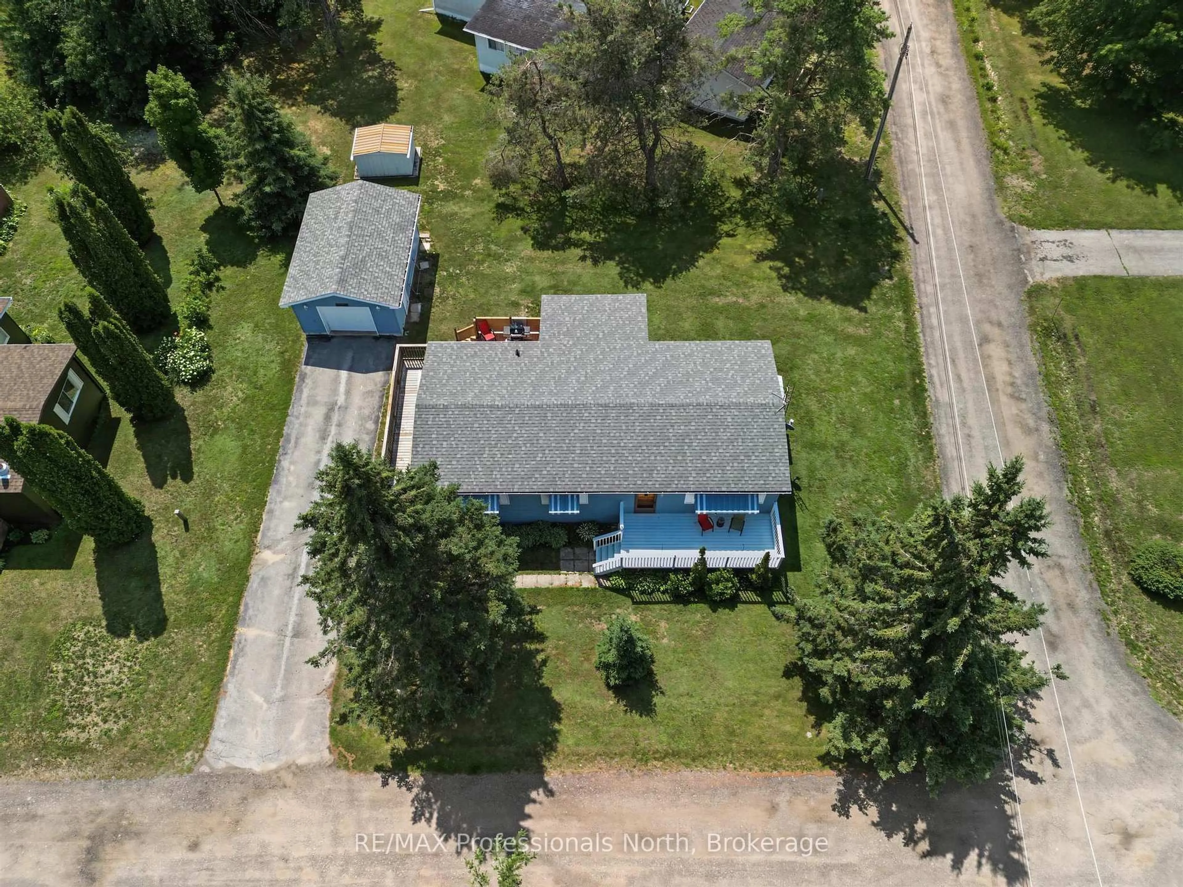 A pic from outside/outdoor area/front of a property/back of a property/a pic from drone, street for 1084 Seventh Lane, Minden Hills Ontario K0M 2K0