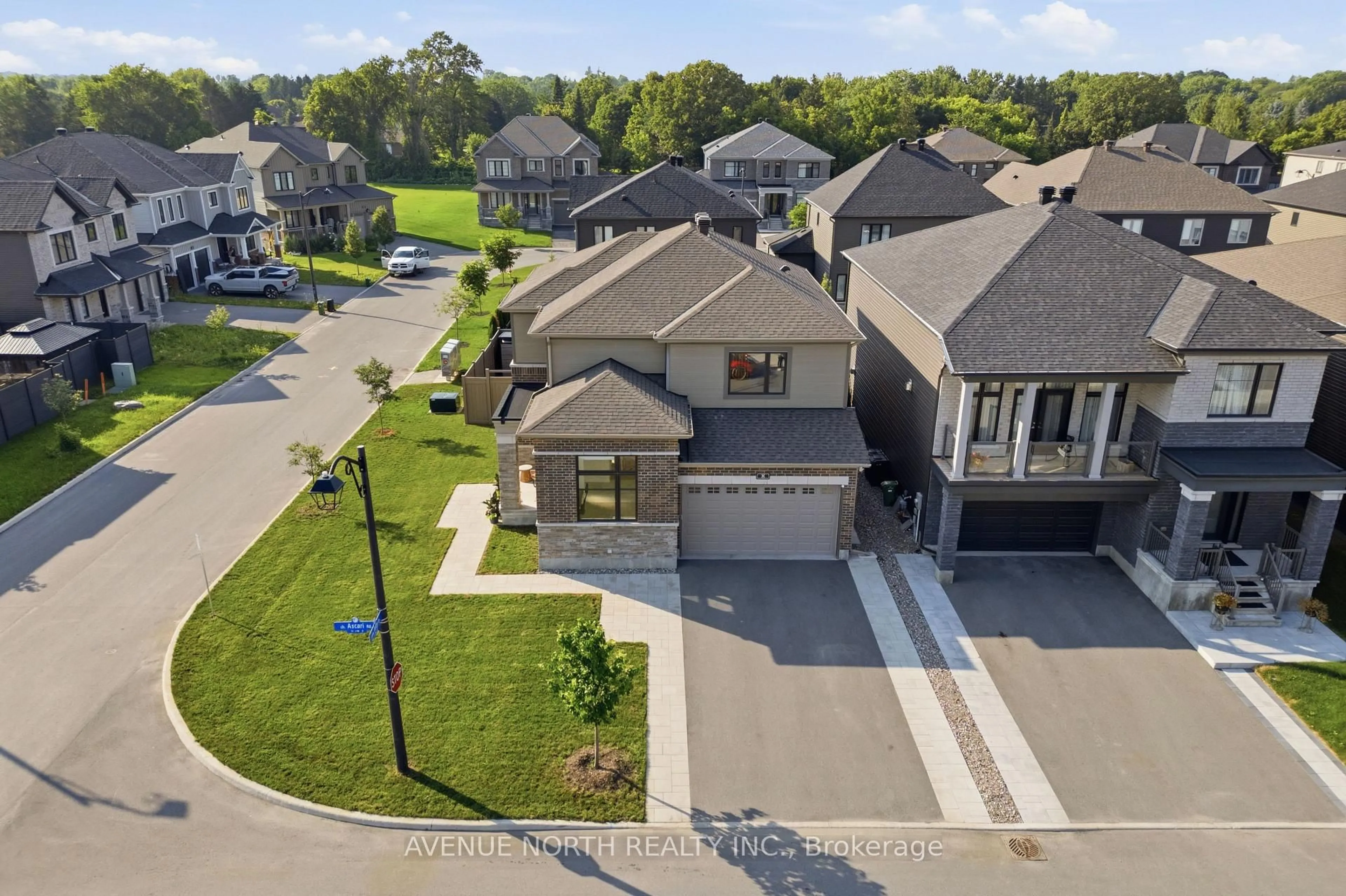 A pic from outside/outdoor area/front of a property/back of a property/a pic from drone, street for 8 Ascari Rd, Manotick Ontario K4M 0M6