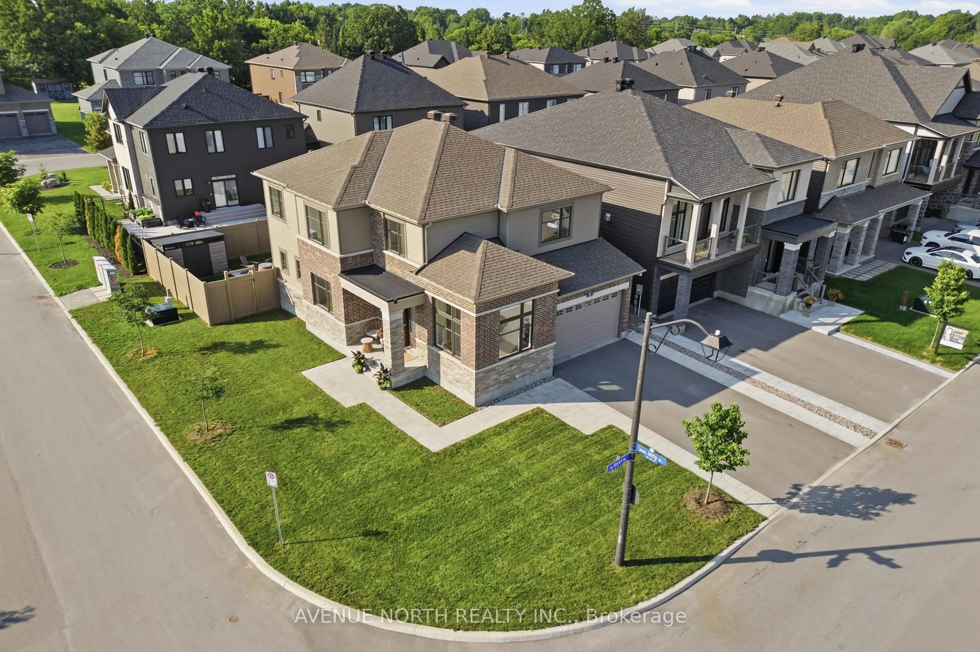 A pic from outside/outdoor area/front of a property/back of a property/a pic from drone, street for 8 Ascari Rd, Manotick Ontario K4M 0M6