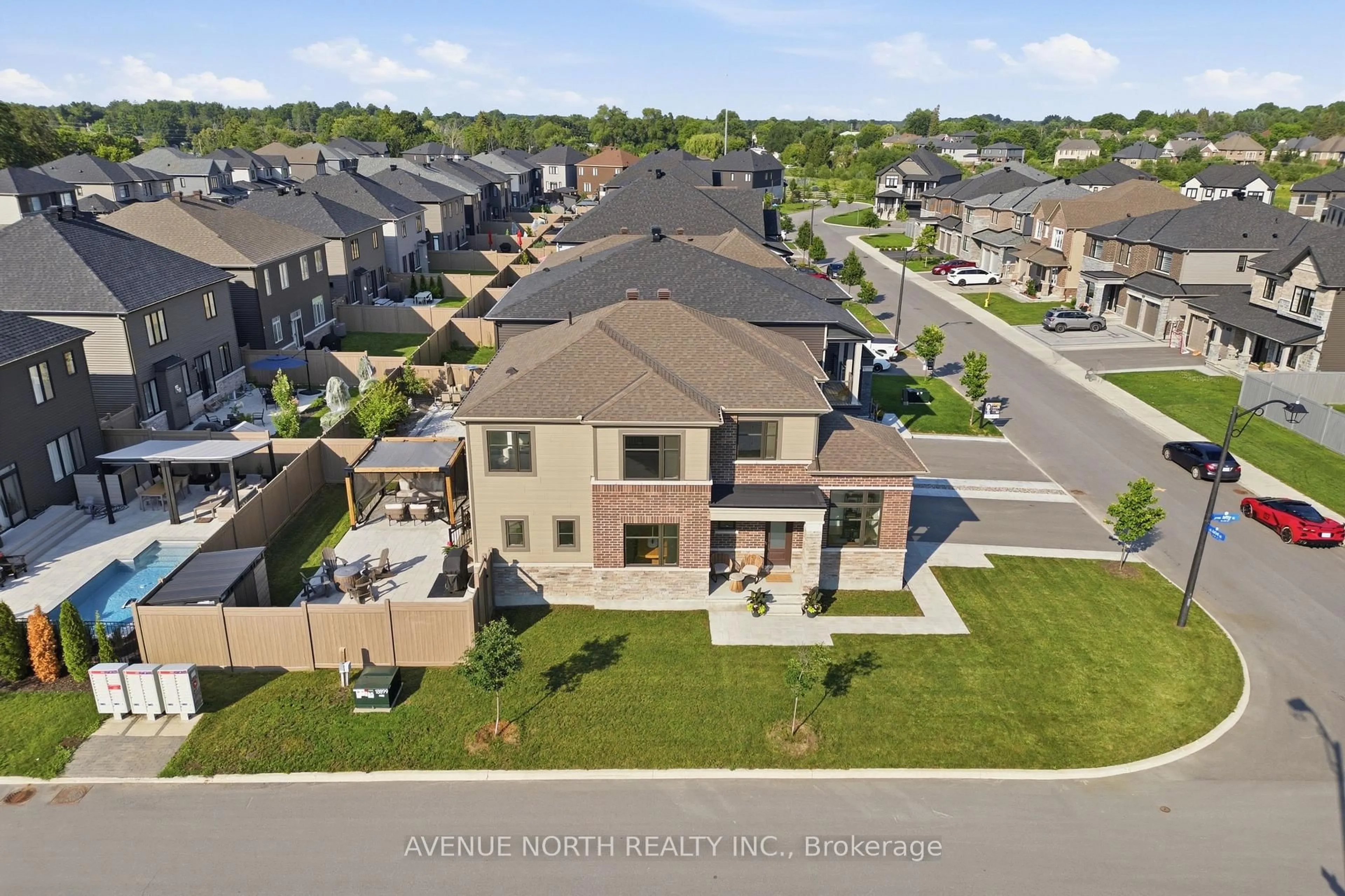A pic from outside/outdoor area/front of a property/back of a property/a pic from drone, street for 8 Ascari Rd, Manotick Ontario K4M 0M6