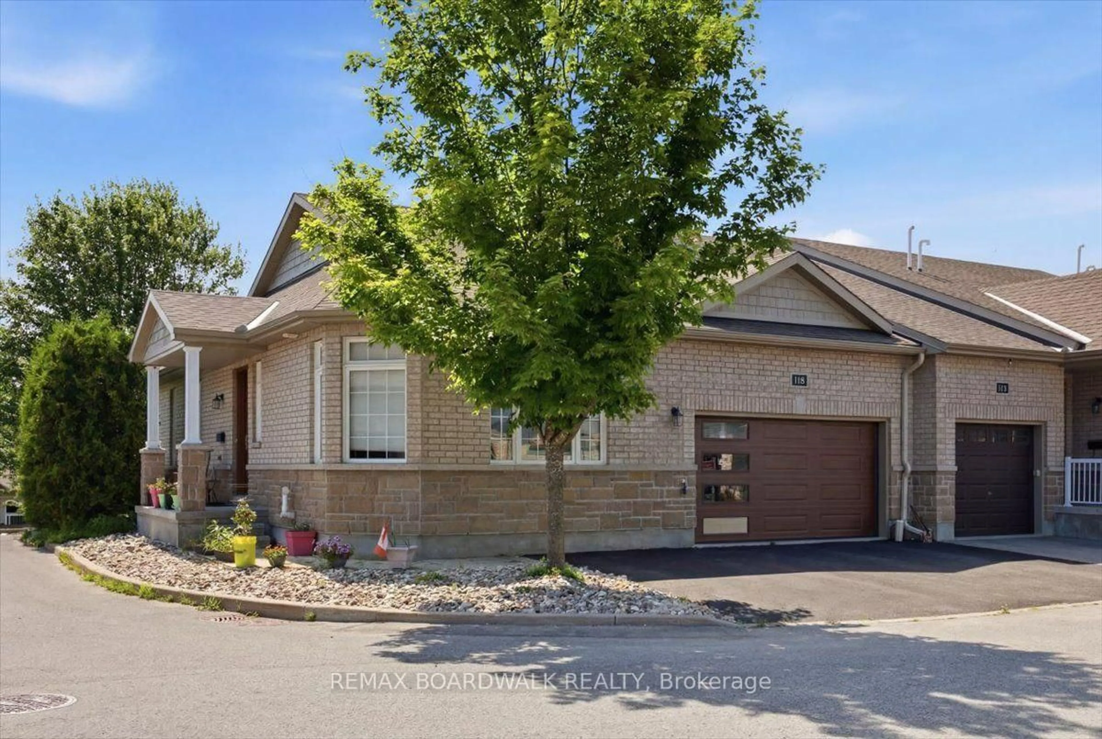 Home with brick exterior material, street for 116 Passageway Private, Kanata Ontario K2M 1H6