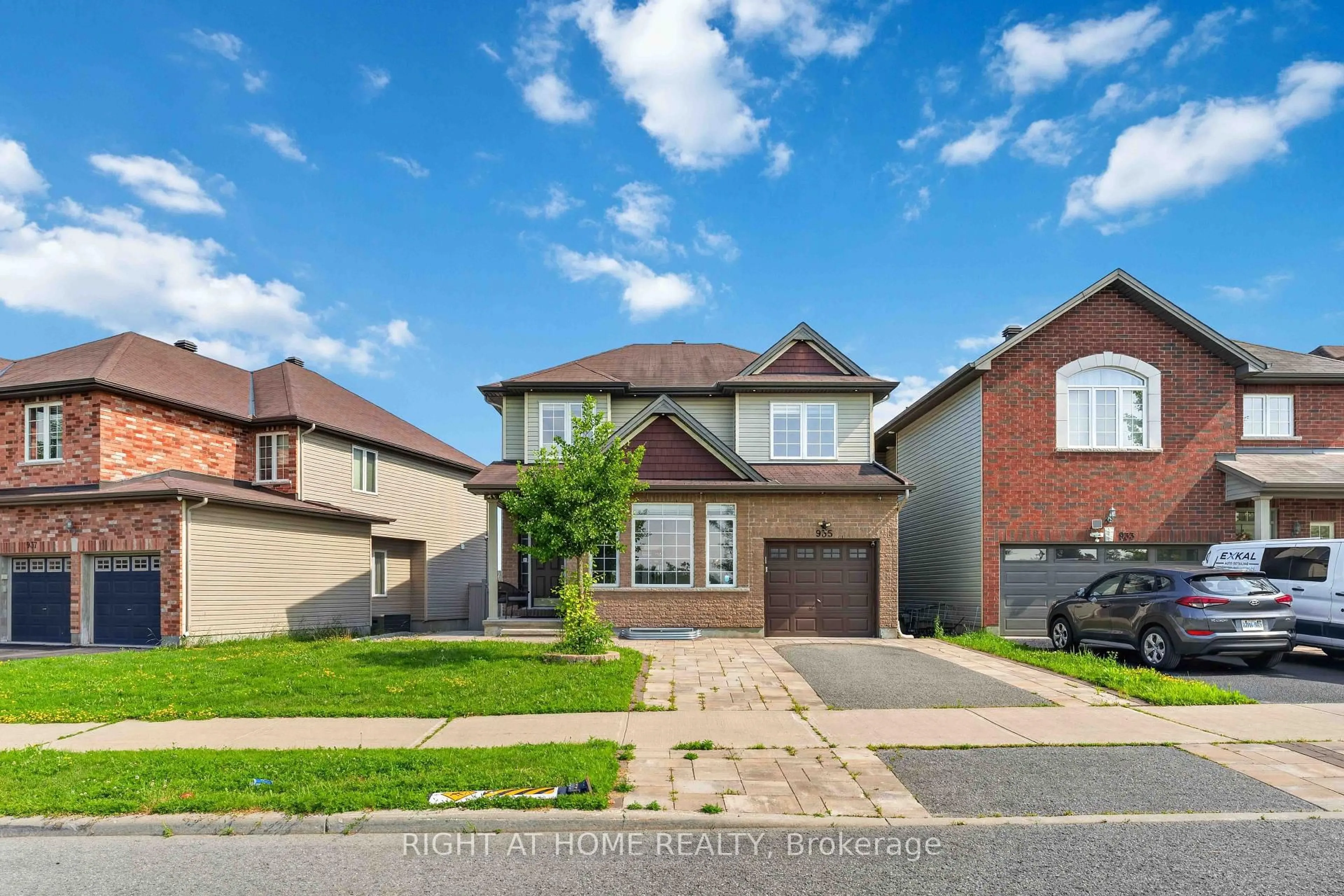 Home with brick exterior material, street for 935 Rotary Way, Ottawa Ontario K1T 0L2