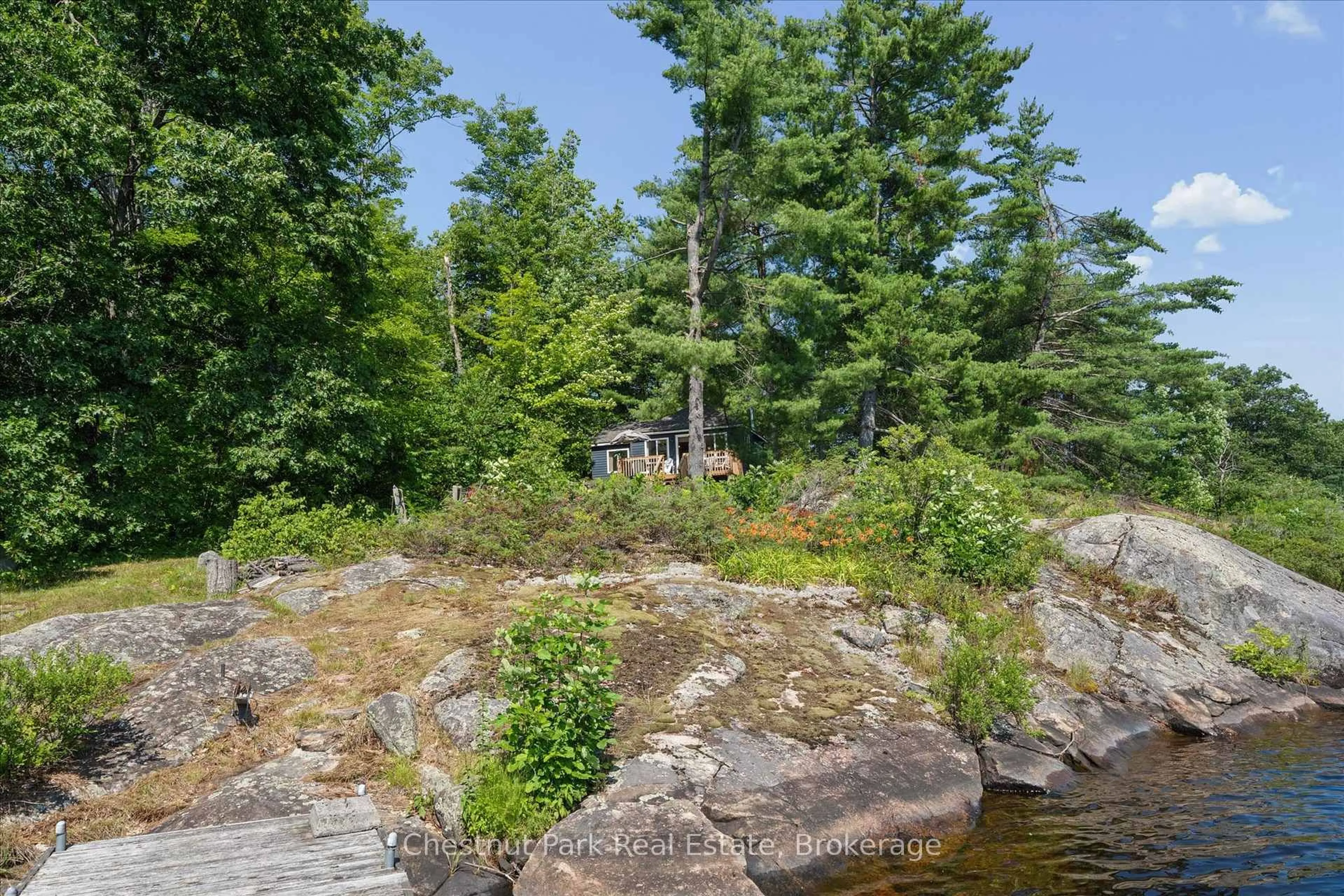 A pic from outside/outdoor area/front of a property/back of a property/a pic from drone, water/lake/river/ocean view for 1040 Fire 6C Rte, Gravenhurst Ontario P1P 1R3