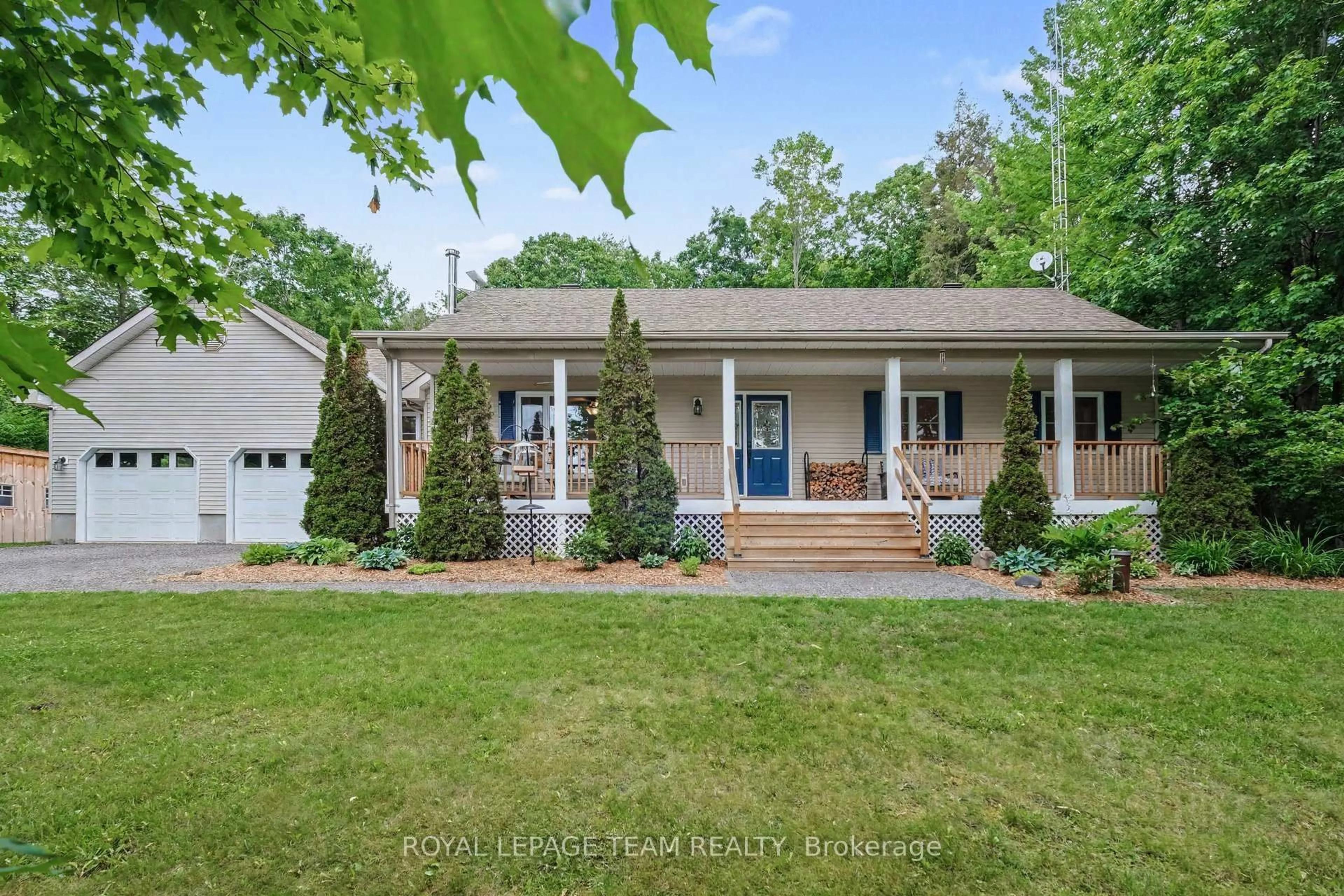 Home with vinyl exterior material, street for 10433 Ronson Rd, North Dundas Ontario K0E 1S0