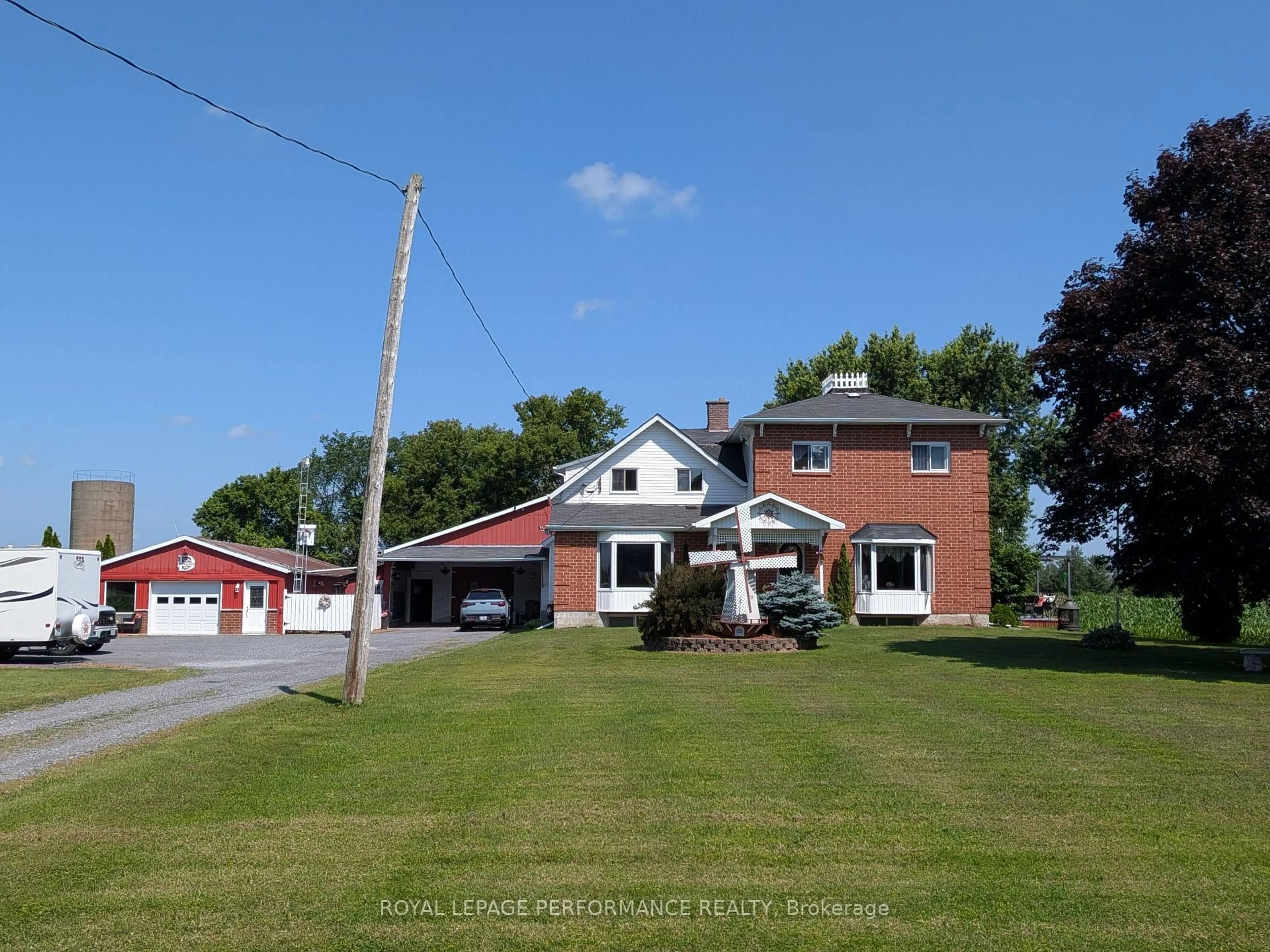 A pic from outside/outdoor area/front of a property/back of a property/a pic from drone, street for 14911 County Rd 43 Rd, North Stormont Ontario K0C 1K0