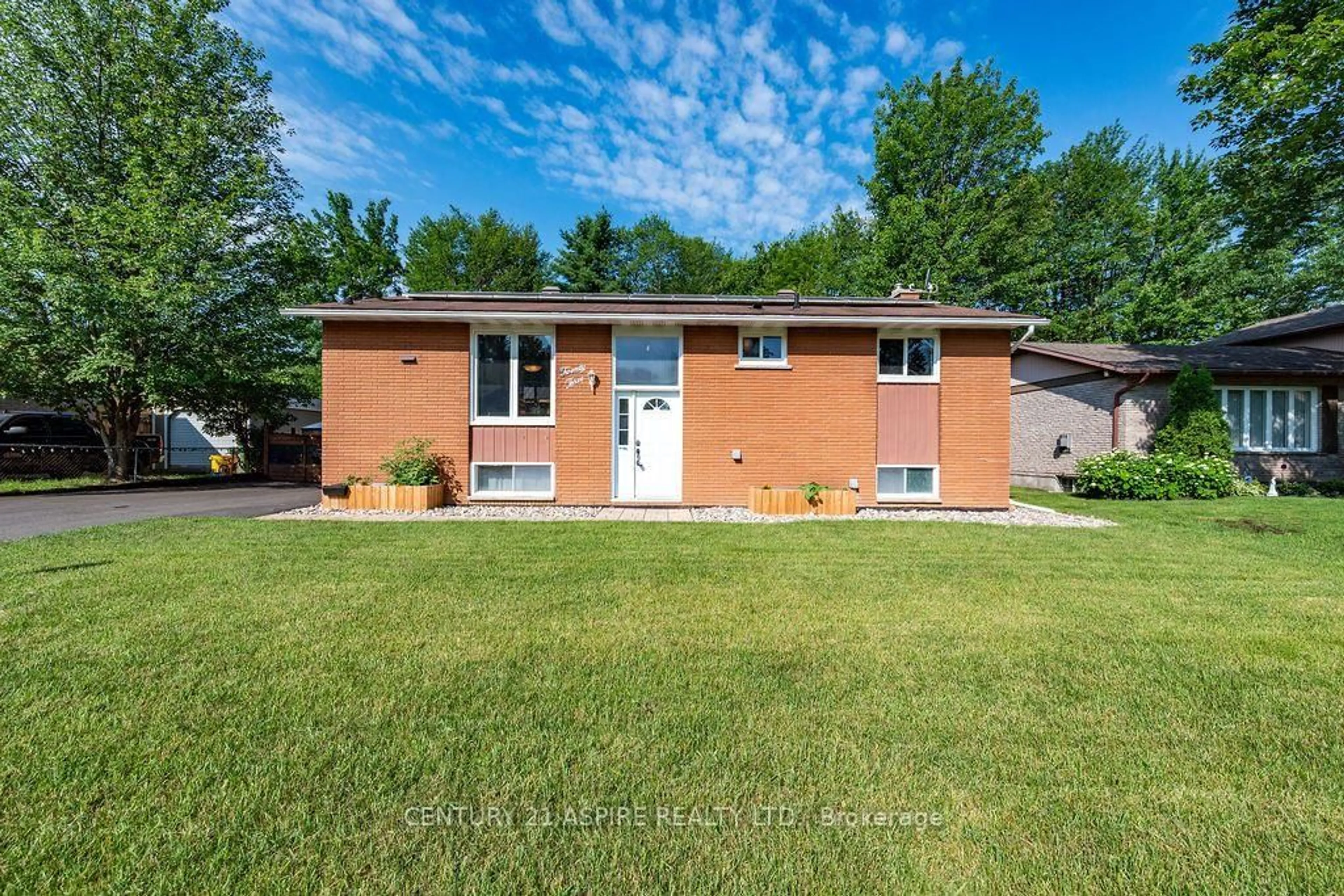 Home with brick exterior material, street for 23 Roy St, Petawawa Ontario K8H 3A5