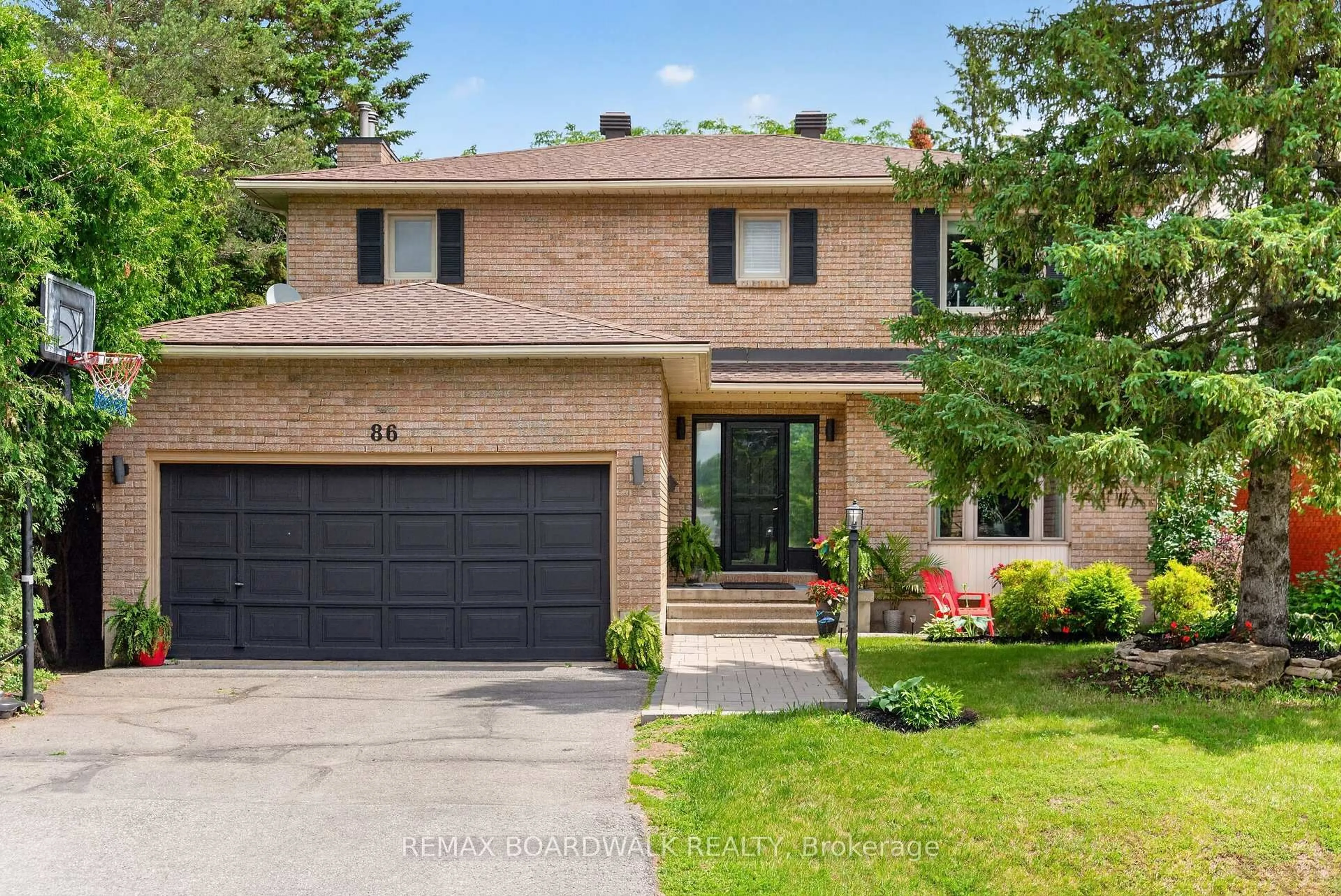 Home with brick exterior material, street for 86 Vanstone Dr, Ottawa Ontario K2L 3T1