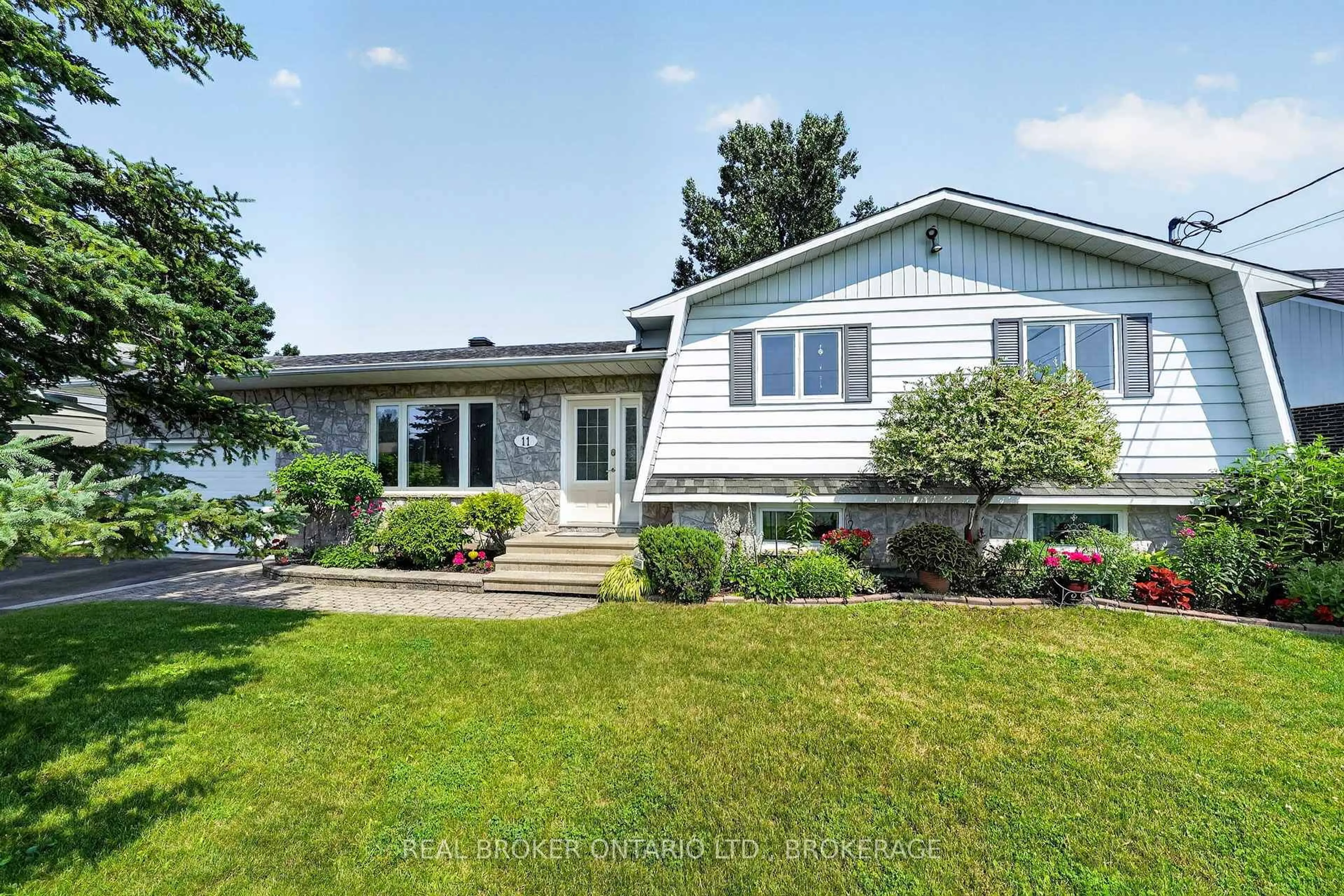 Home with vinyl exterior material, street for 11 Albert St, Casselman Ontario K0A 1M0