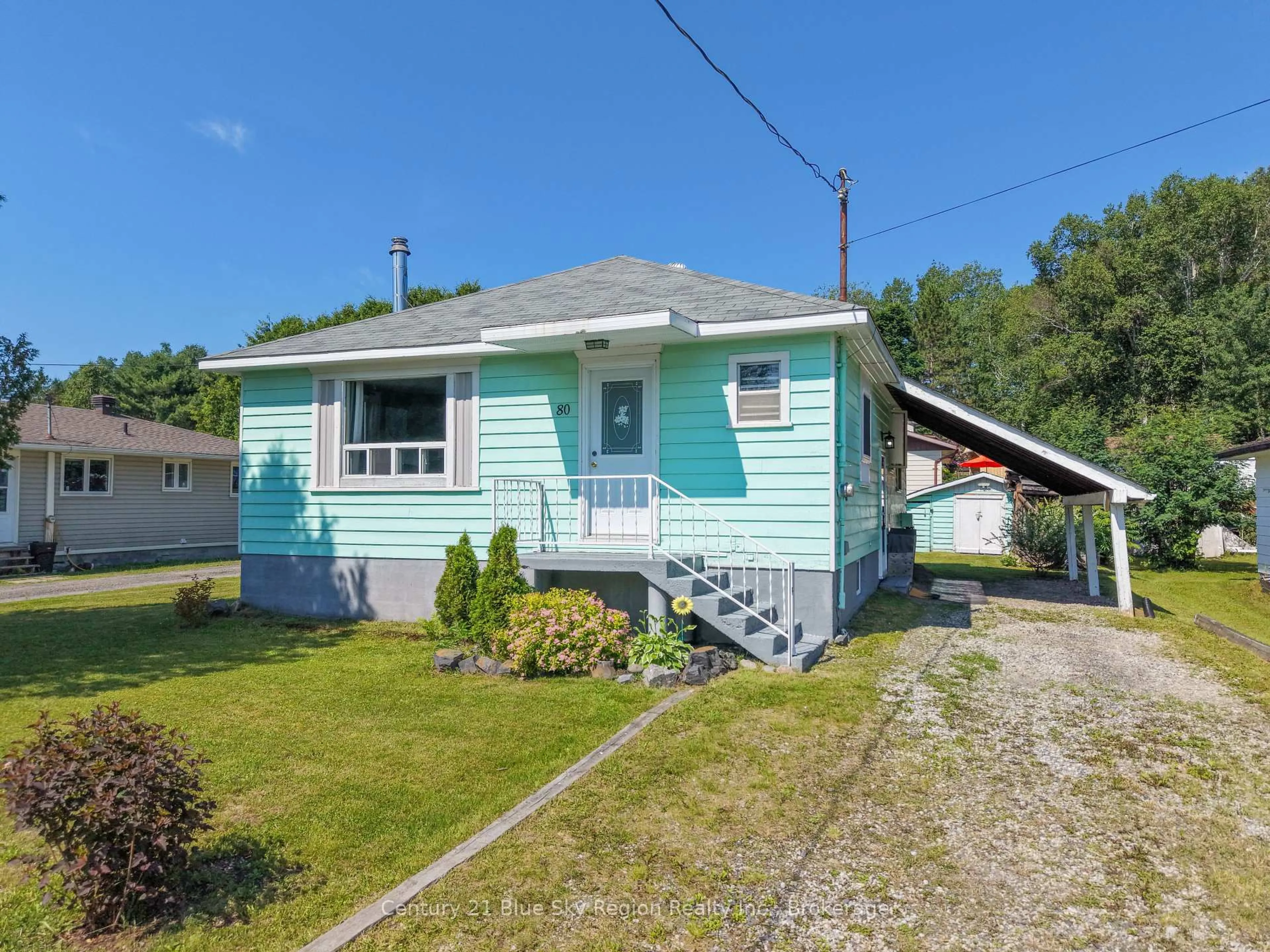 Home with vinyl exterior material, street for 80 Spruce Dr, Temagami Ontario P0H 2H0
