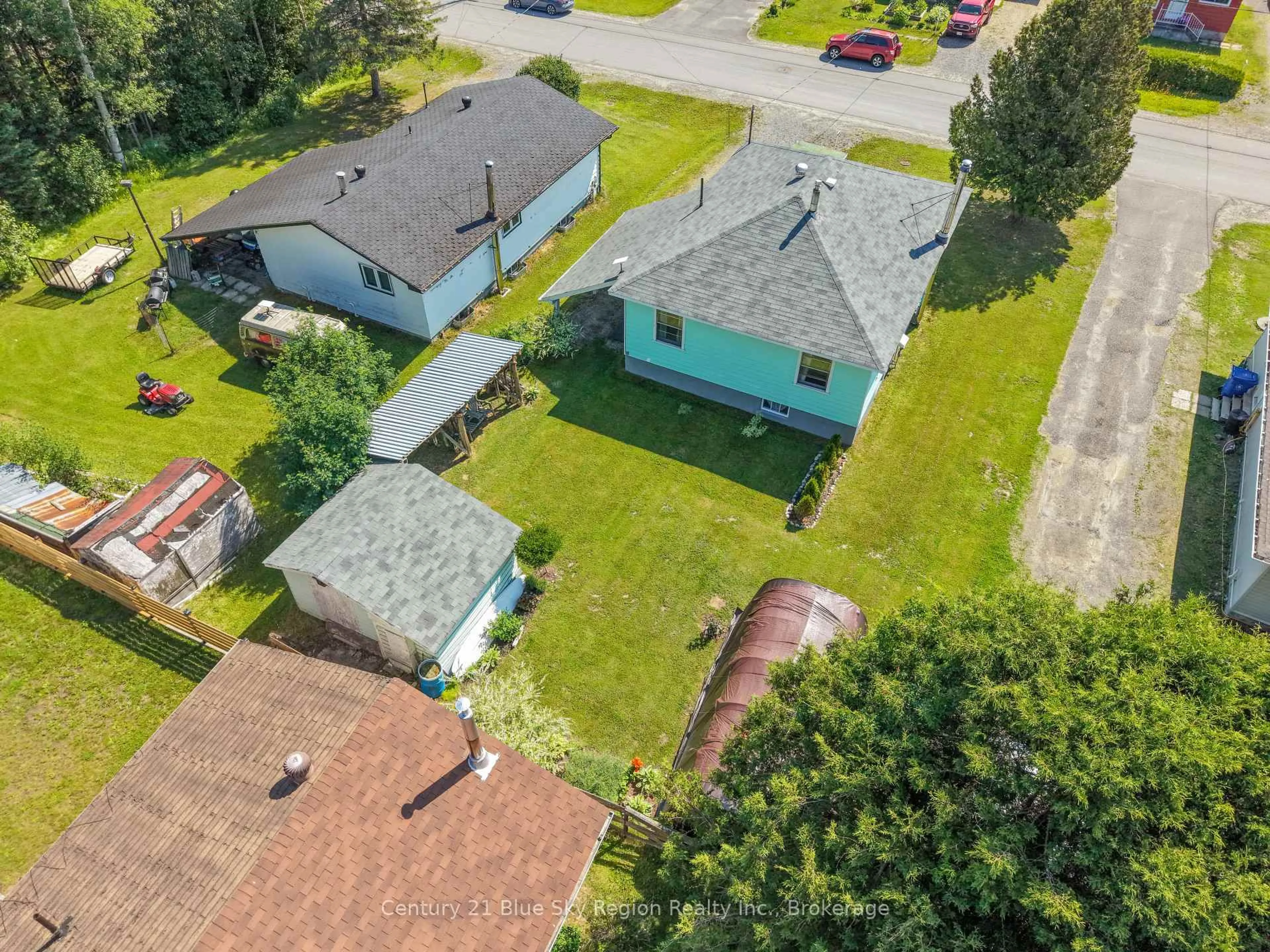 A pic from outside/outdoor area/front of a property/back of a property/a pic from drone, street for 80 Spruce Dr, Temagami Ontario P0H 2H0