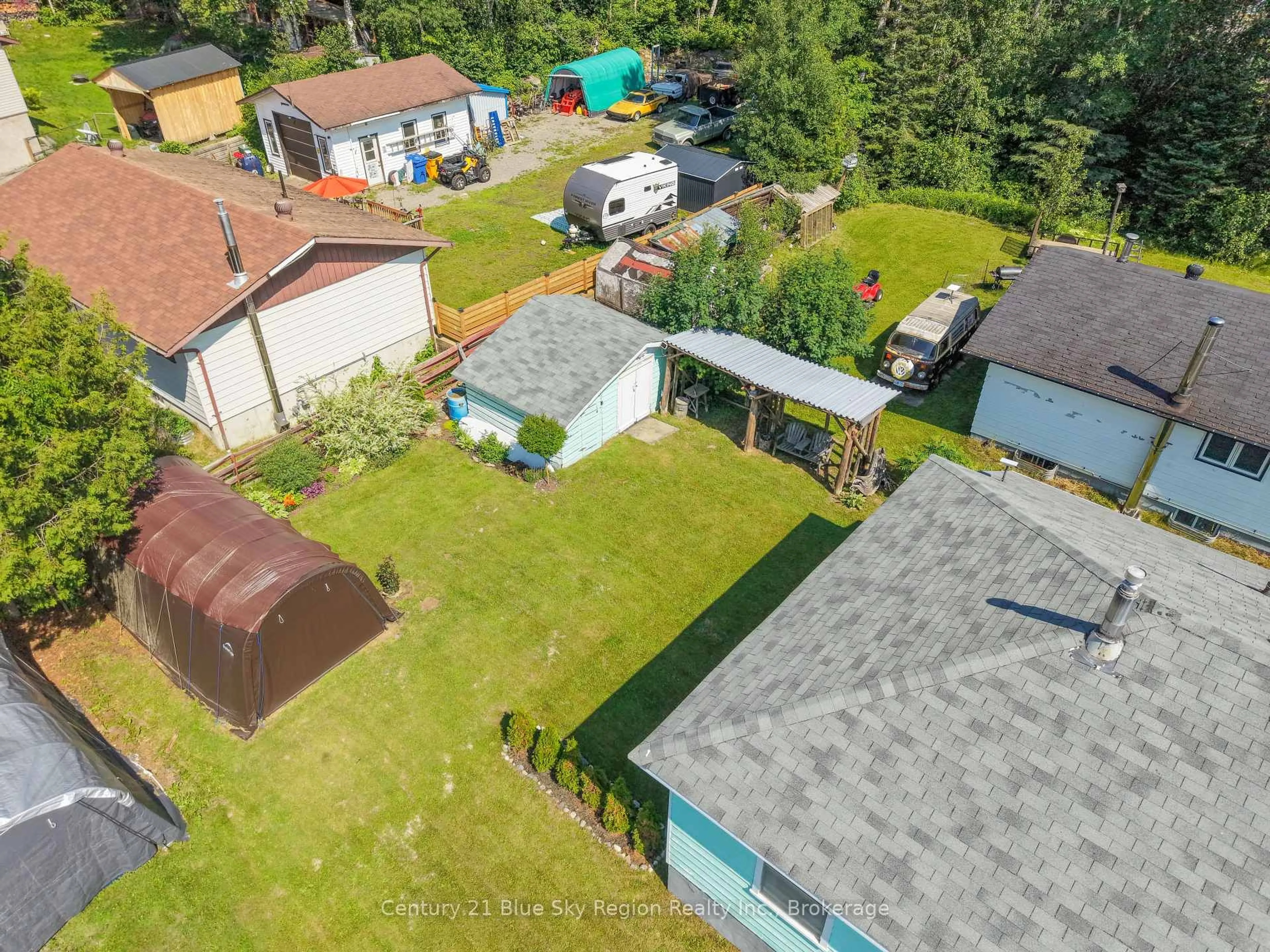 A pic from outside/outdoor area/front of a property/back of a property/a pic from drone, street for 80 Spruce Dr, Temagami Ontario P0H 2H0