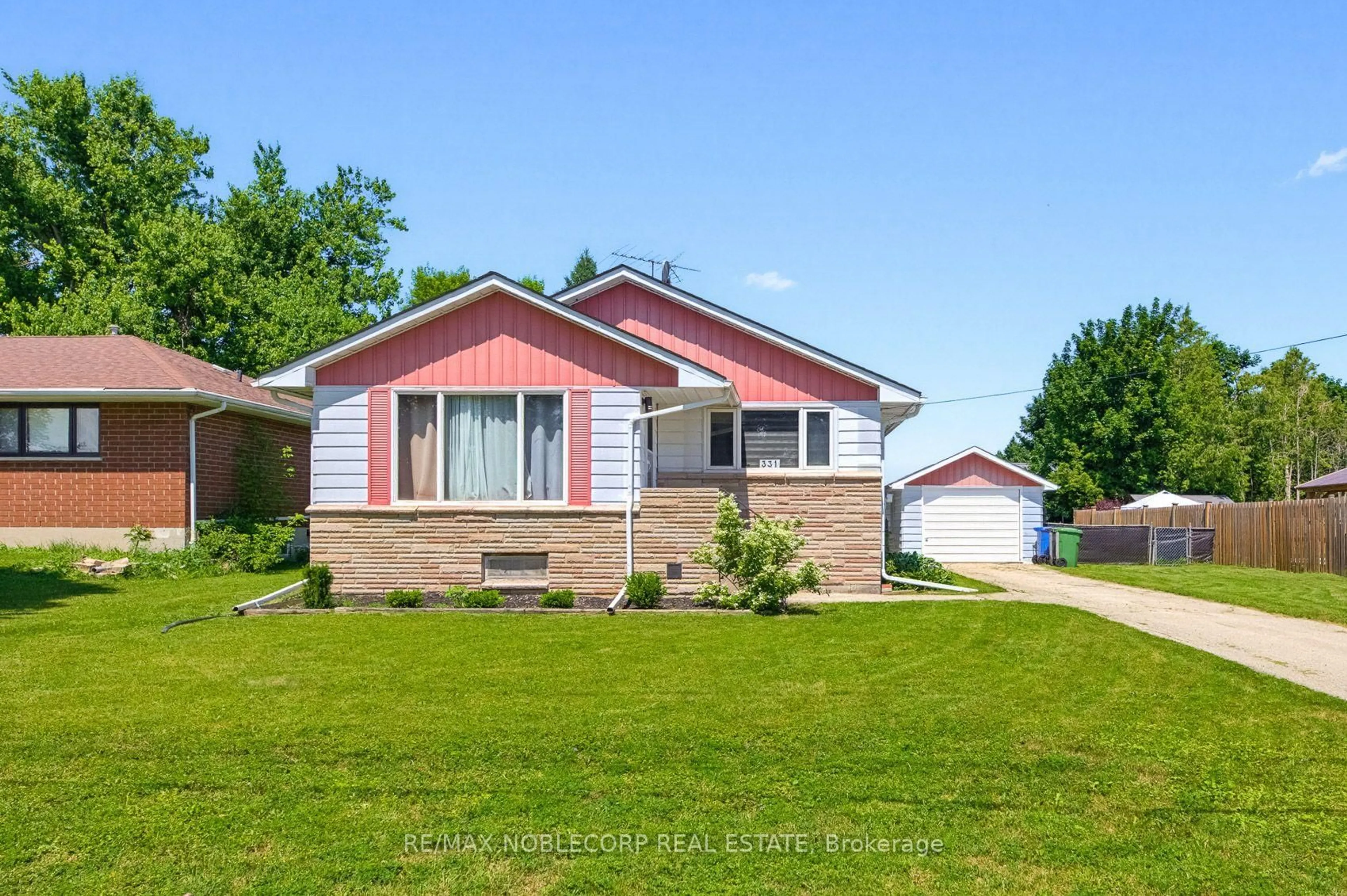 Home with brick exterior material, street for 331 Victoria St, Southgate Ontario N0C 1B0