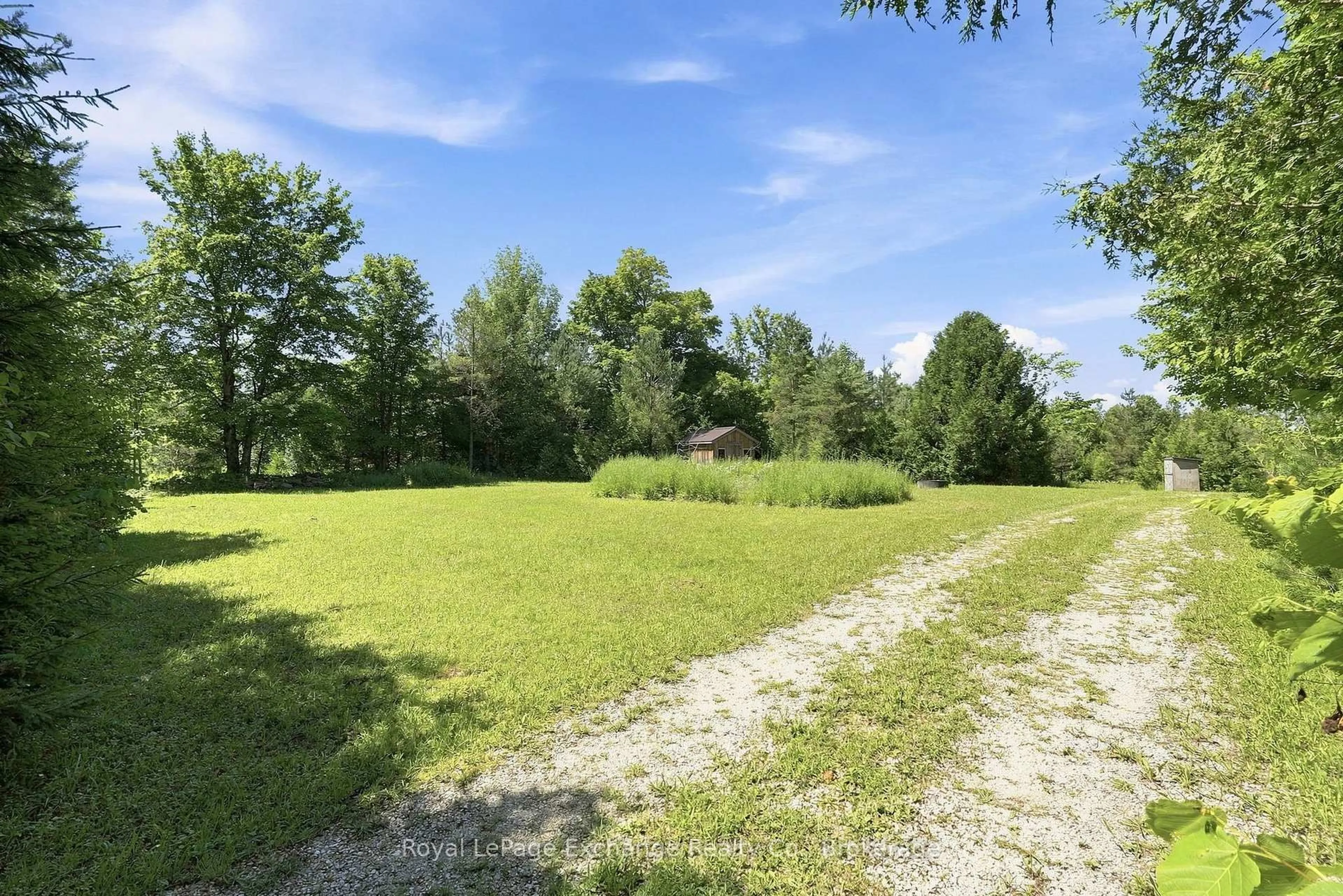 A pic from outside/outdoor area/front of a property/back of a property/a pic from drone, forest/trees view for 495144 Traverston Rd, West Grey Ontario N0C 1H0