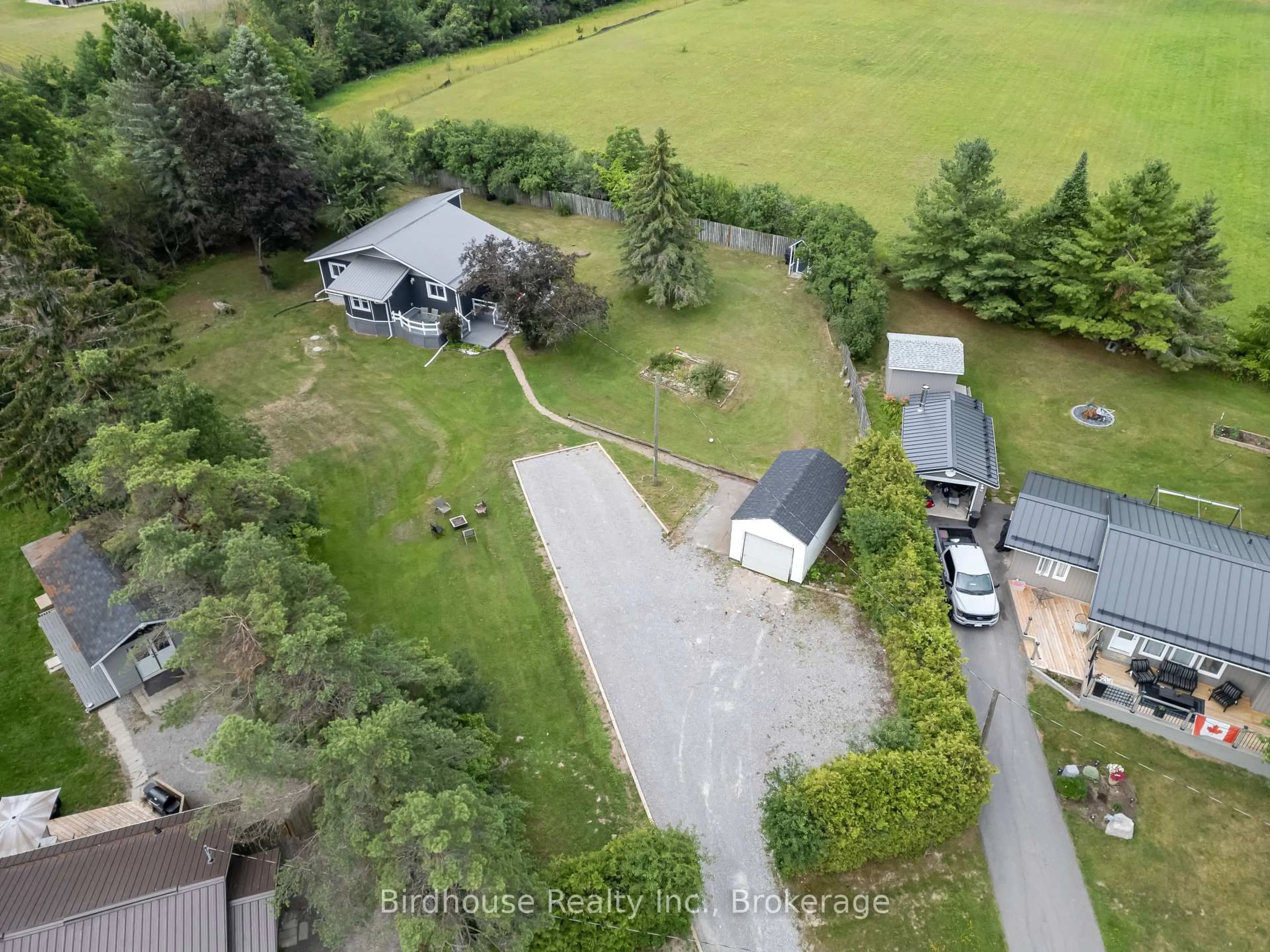 A pic from outside/outdoor area/front of a property/back of a property/a pic from drone, unknown for 9 Hapley Circ, Kawartha Lakes Ontario K0M 1A0