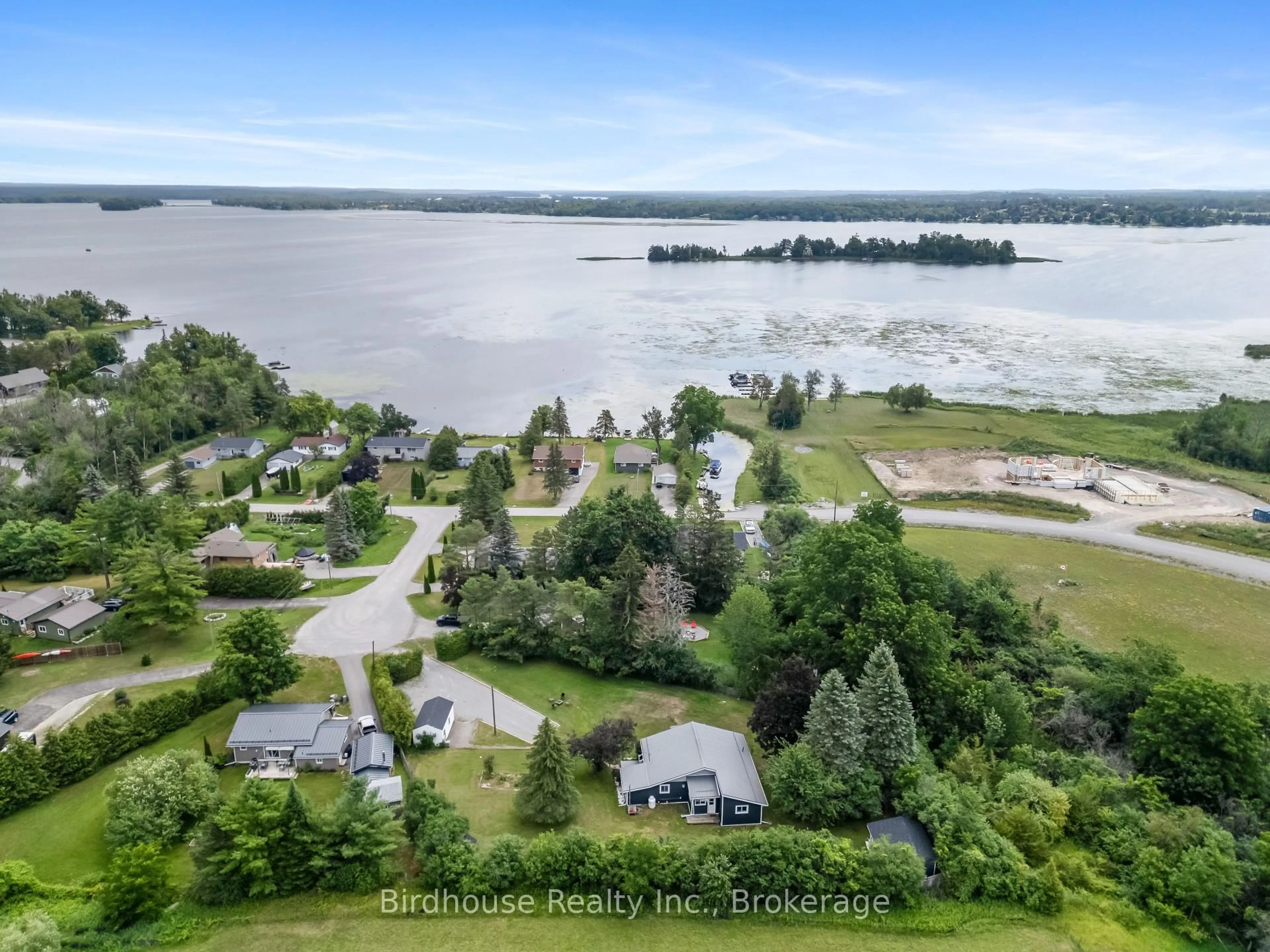 A pic from outside/outdoor area/front of a property/back of a property/a pic from drone, water/lake/river/ocean view for 9 Hapley Circ, Kawartha Lakes Ontario K0M 1A0