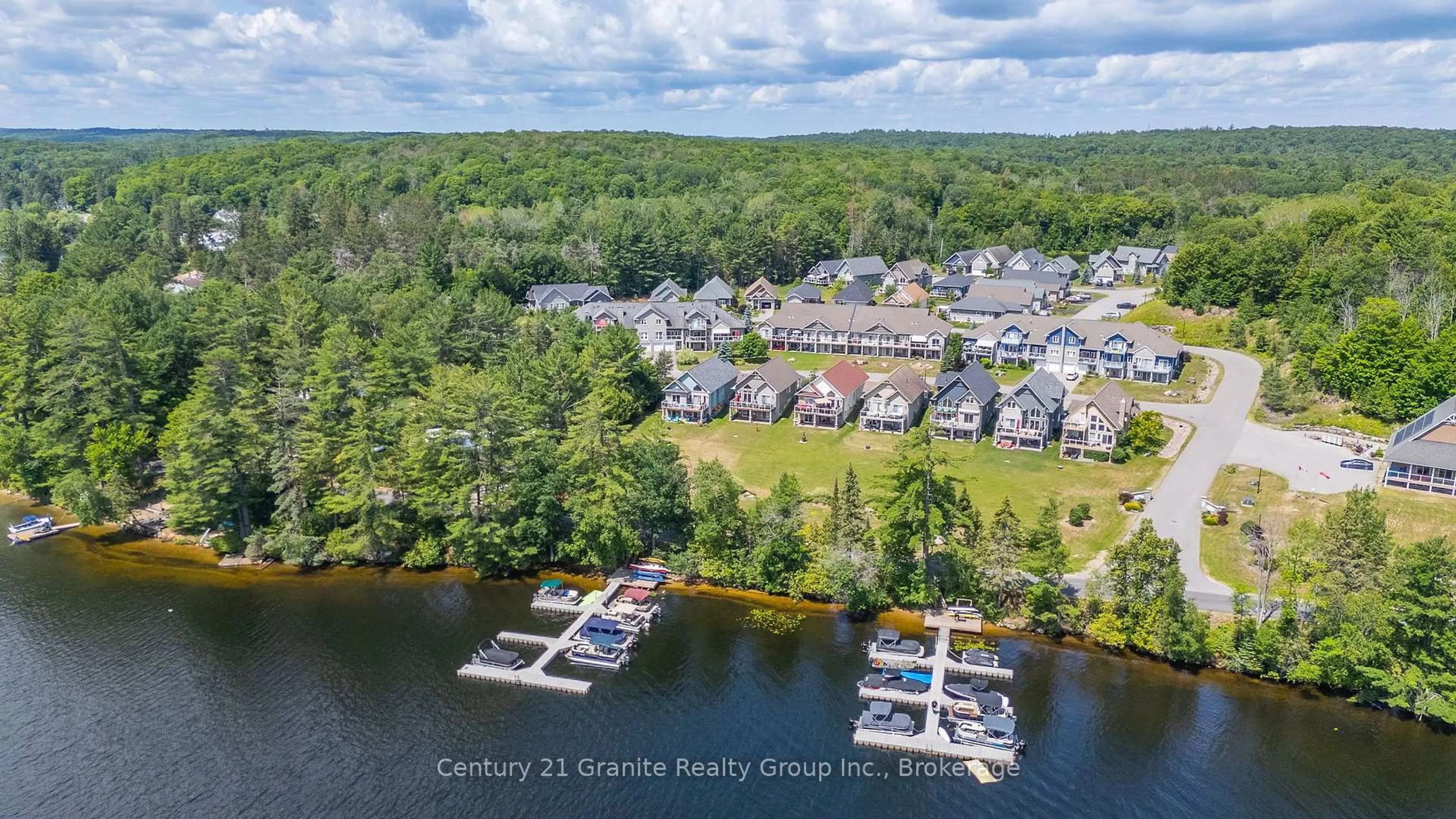 A pic from outside/outdoor area/front of a property/back of a property/a pic from drone, water/lake/river/ocean view for 17 Webb Circ, Dysart et al Ontario K0M 1S0