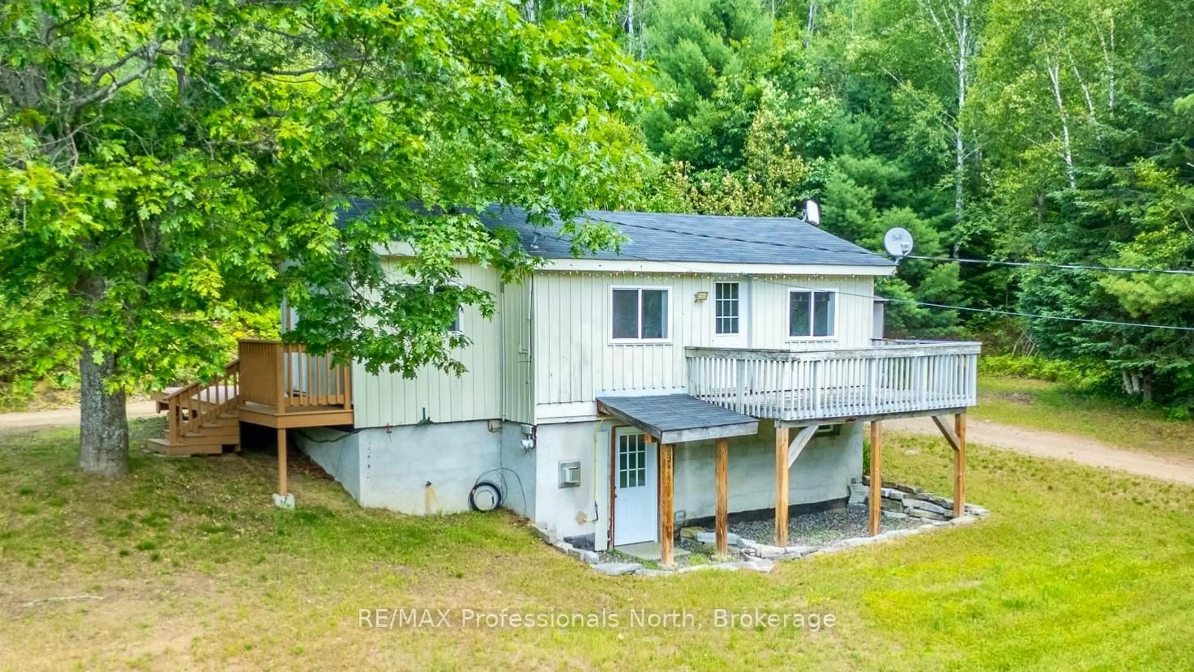 A pic from outside/outdoor area/front of a property/back of a property/a pic from drone, unknown for 1468 Barry Line, Algonquin Highlands Ontario K0M 1J0