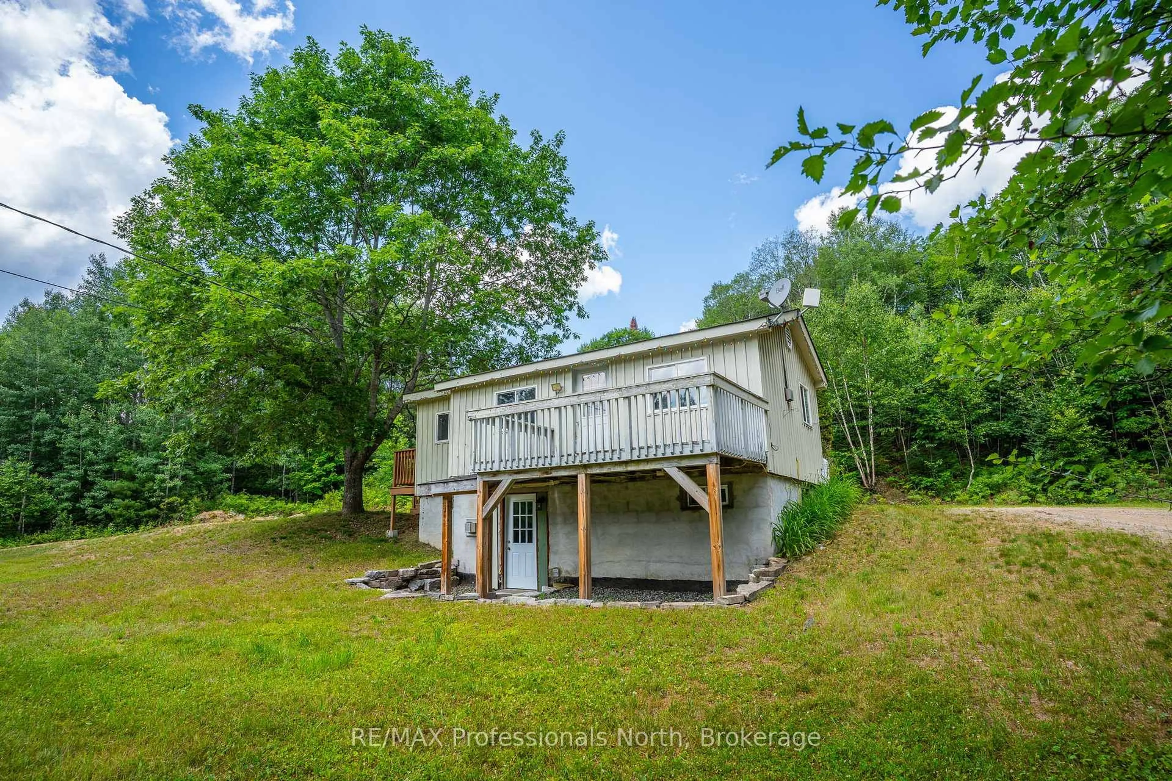 A pic from outside/outdoor area/front of a property/back of a property/a pic from drone, water/lake/river/ocean view for 1468 Barry Line, Algonquin Highlands Ontario K0M 1J0