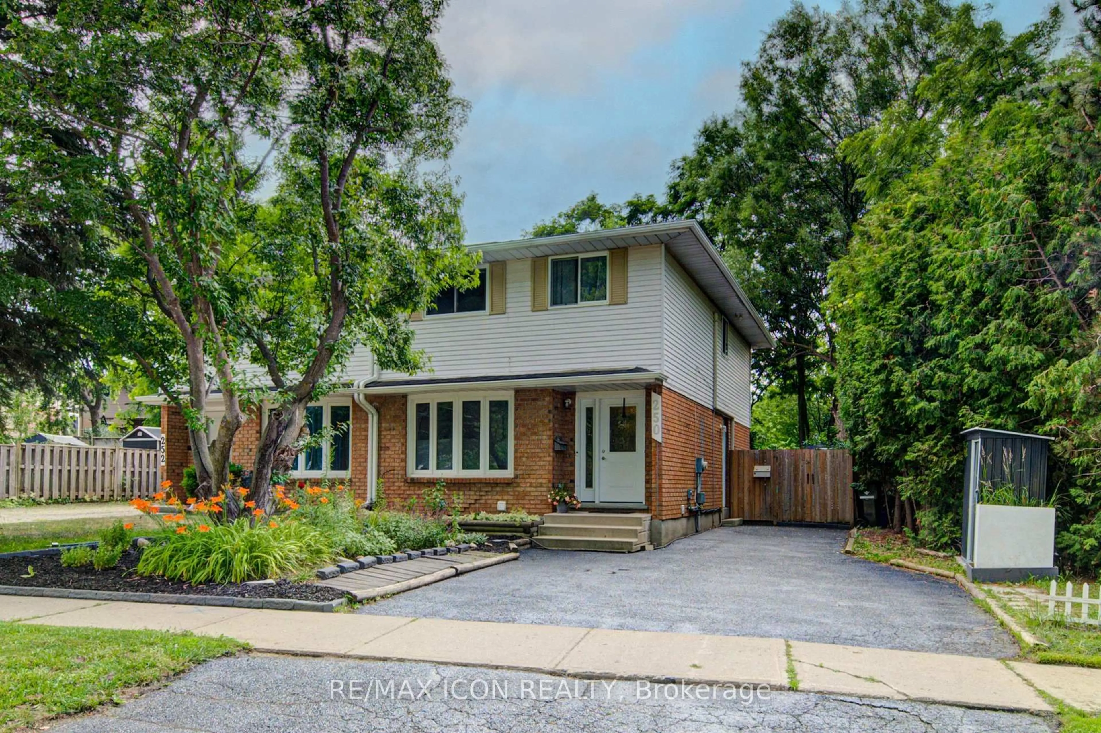 Home with brick exterior material, street for 250 Dinison Cres, Kitchener Ontario N2E 3G8