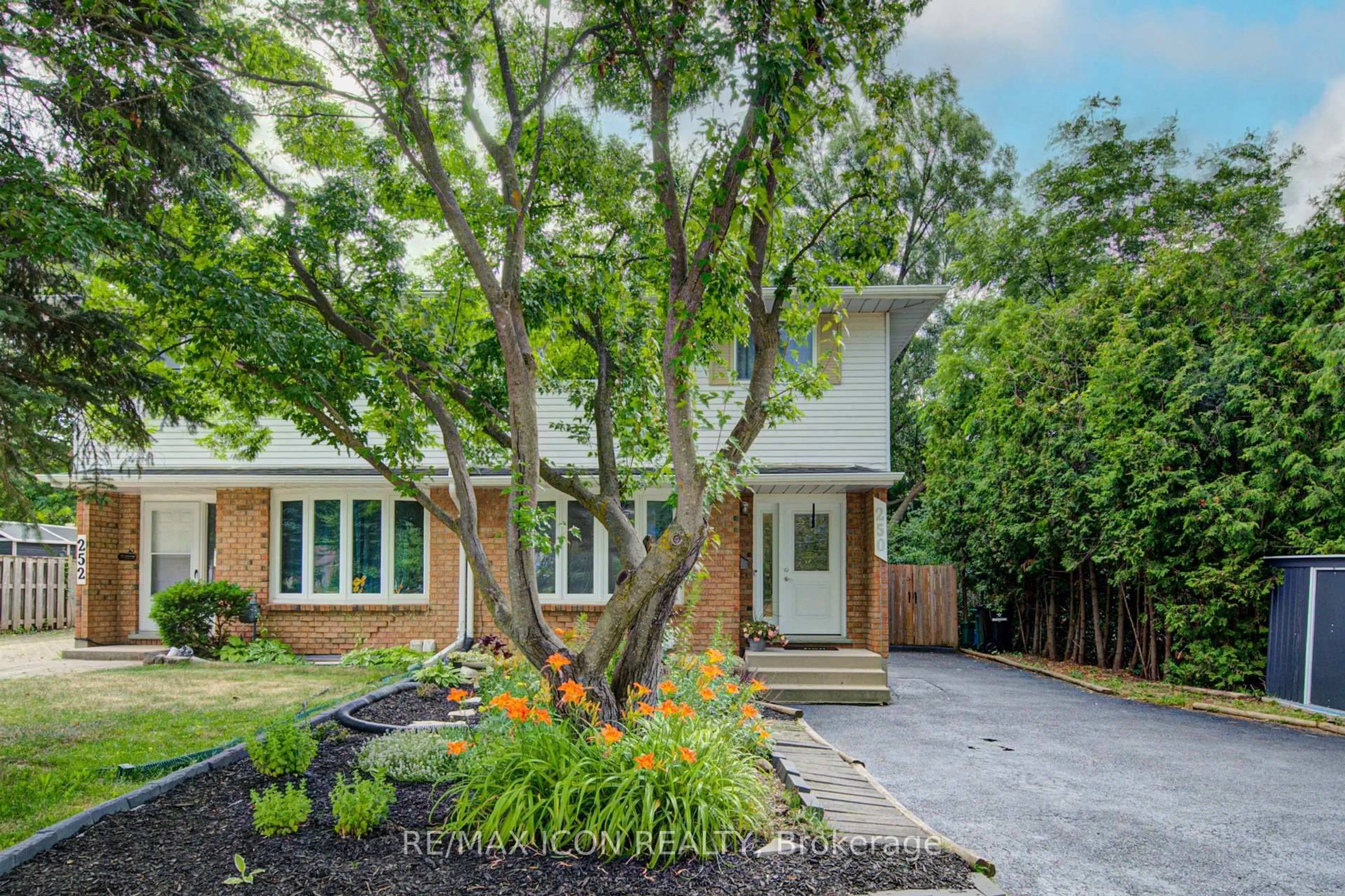 Home with brick exterior material, street for 250 Dinison Cres, Kitchener Ontario N2E 3G8