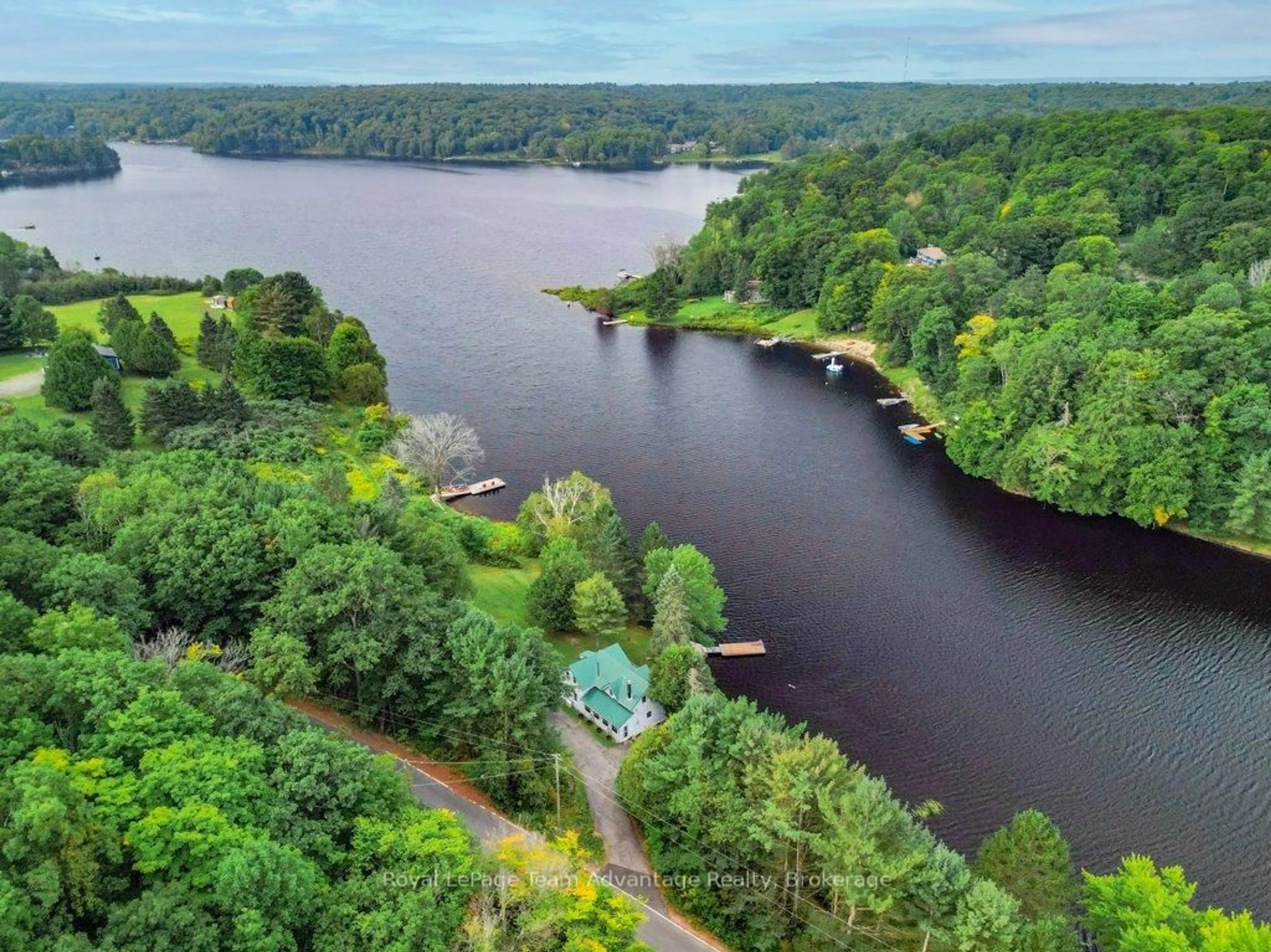 A pic from outside/outdoor area/front of a property/back of a property/a pic from drone, water/lake/river/ocean view for 27 BURNSIDE BRIDGE Rd, McDougall Ontario P2A 2W9
