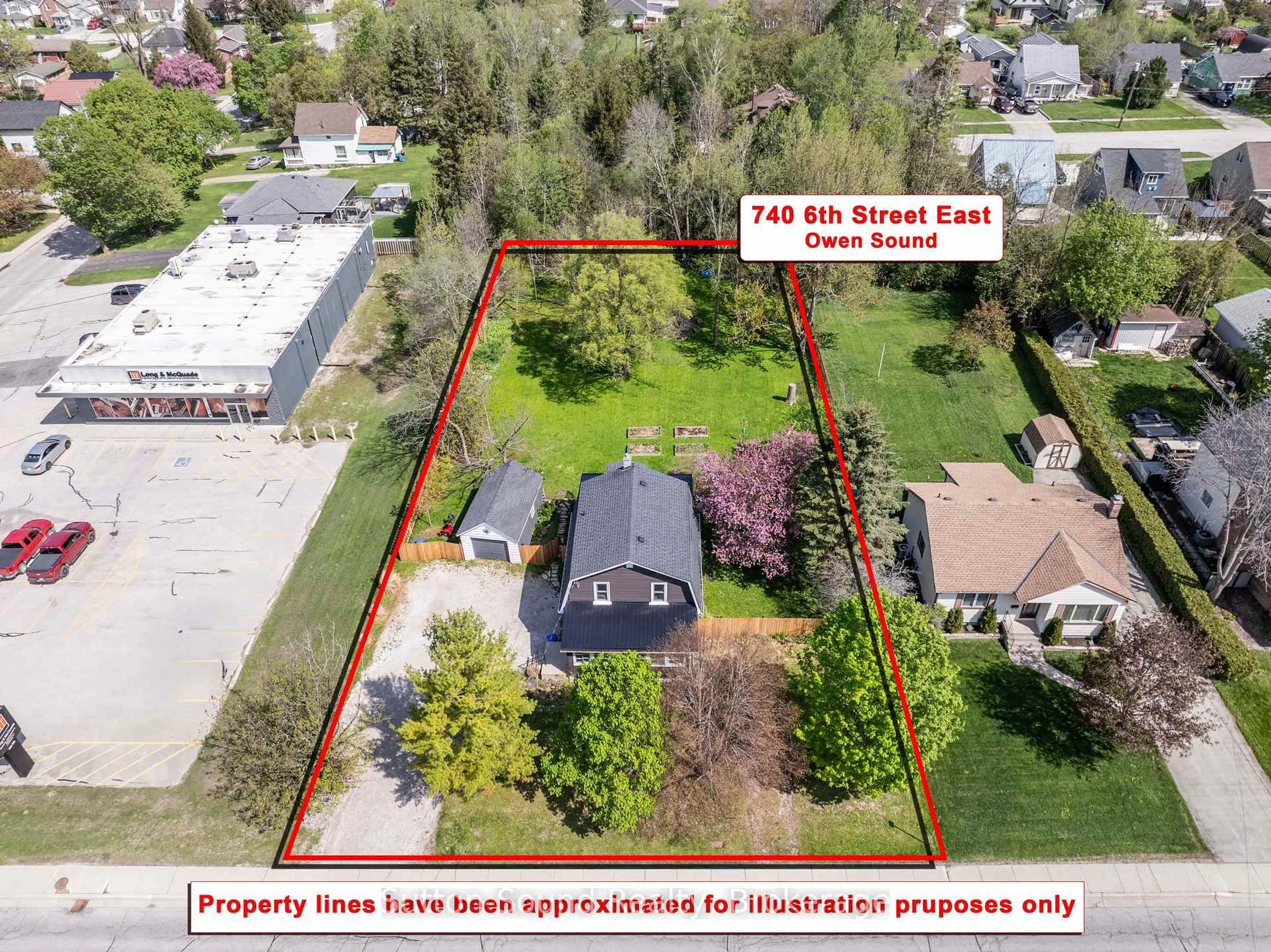 A pic from outside/outdoor area/front of a property/back of a property/a pic from drone, street for 740 6th St, Owen Sound Ontario N4K 1G7
