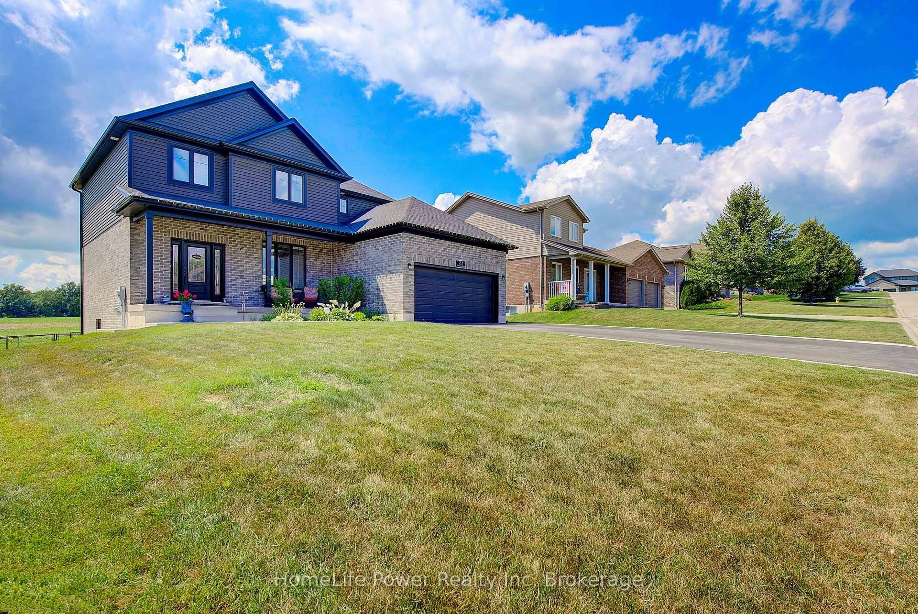A pic from outside/outdoor area/front of a property/back of a property/a pic from drone, street for 21 Morning Glory Dr, Tillsonburg Ontario N4G 5S9