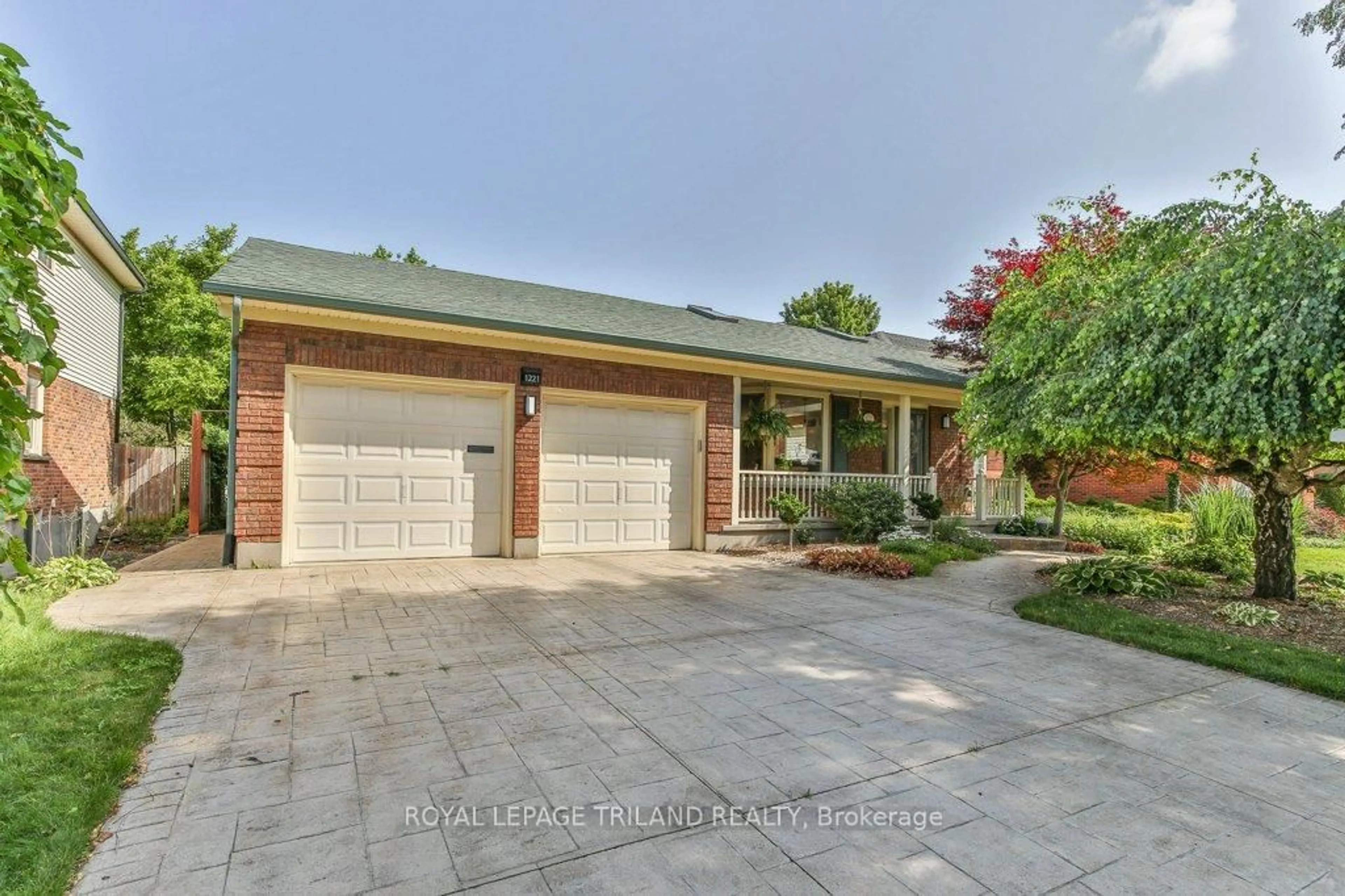 Home with brick exterior material, street for 1221 GLENORA Dr, London North Ontario N5X 2P6
