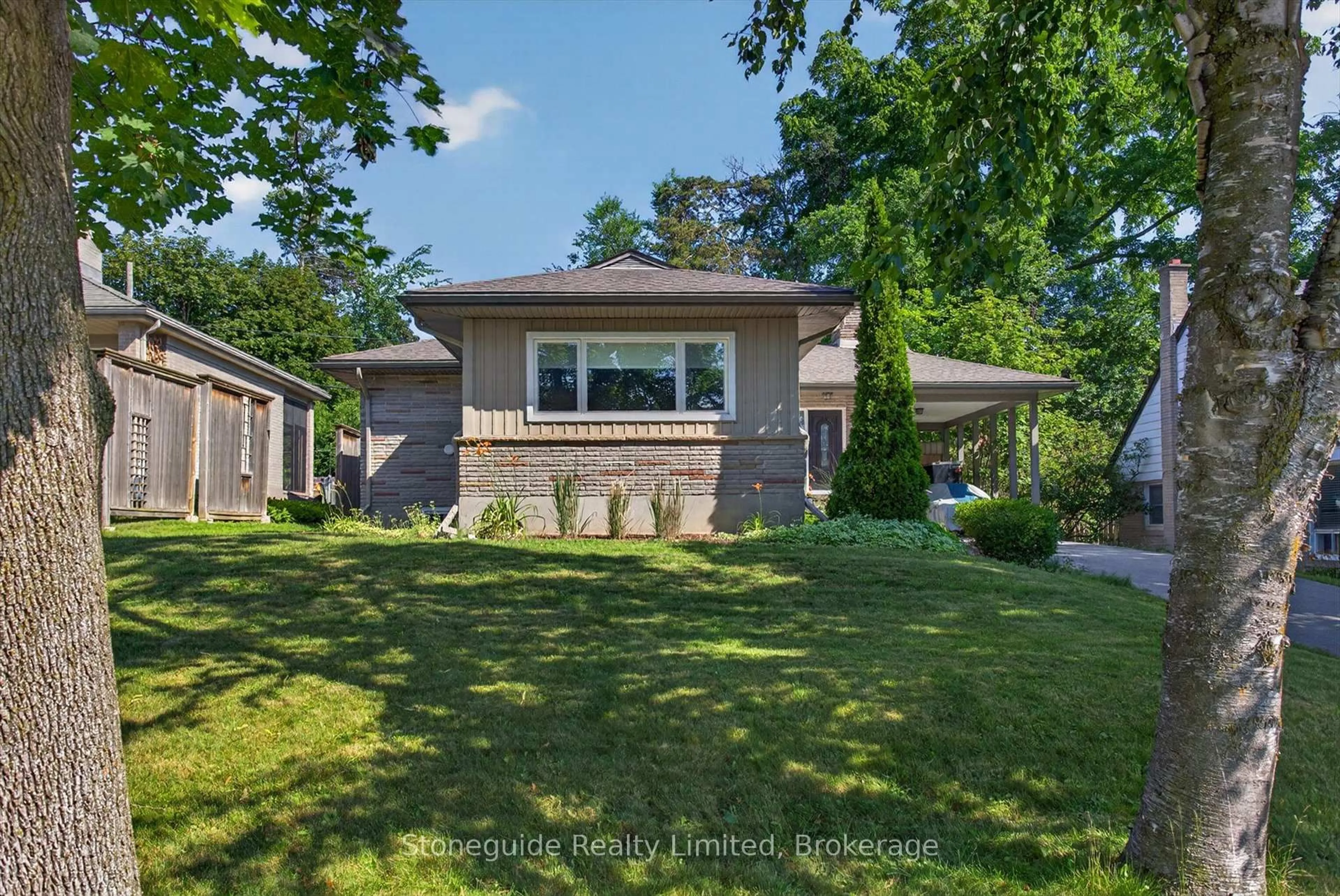 Home with brick exterior material, street for 702 Walkerfield Ave, Peterborough Ontario K9J 4W4