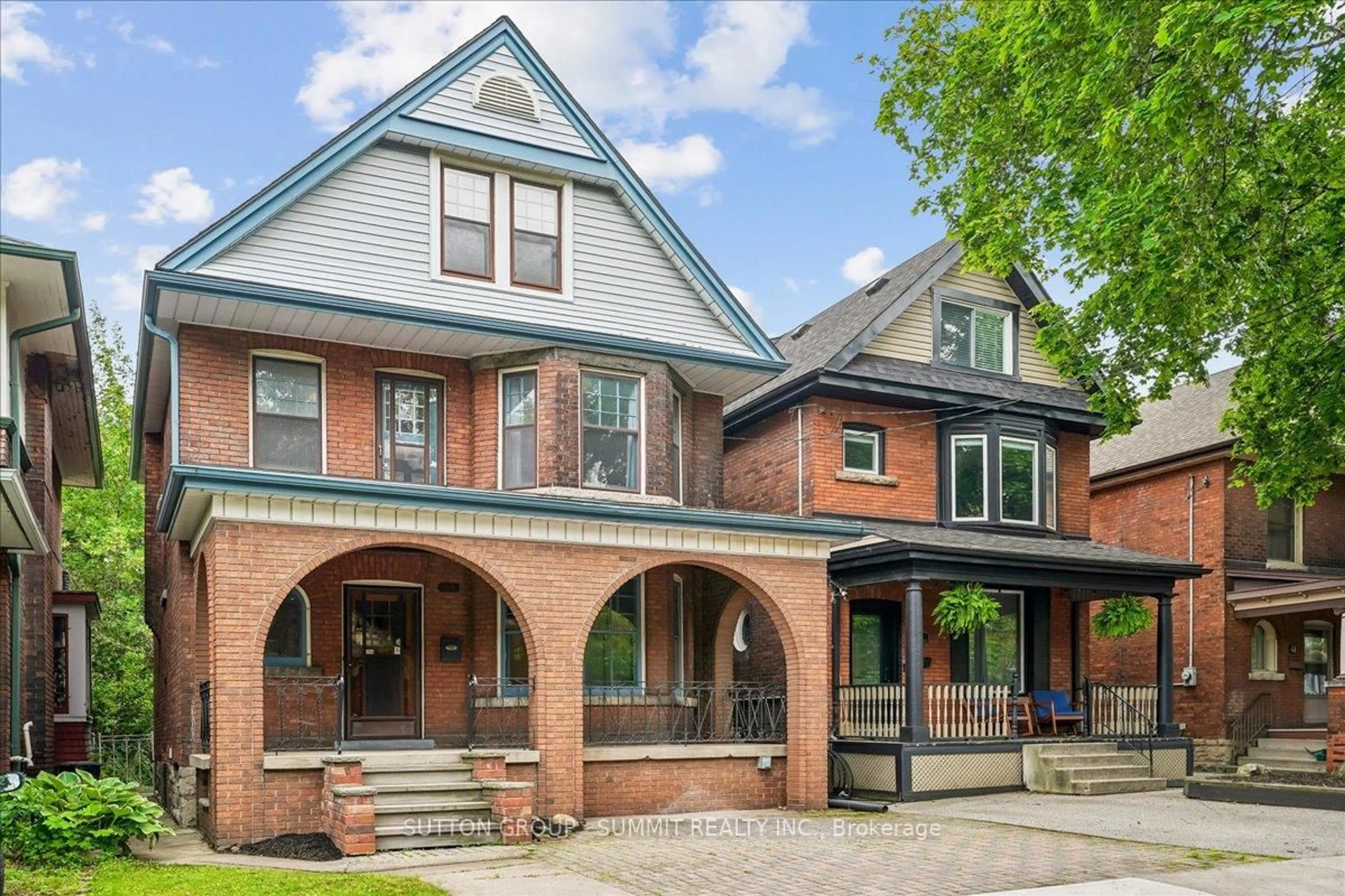 Home with brick exterior material, street for 33 Saint Clair Ave, Hamilton Ontario L8M 2N4