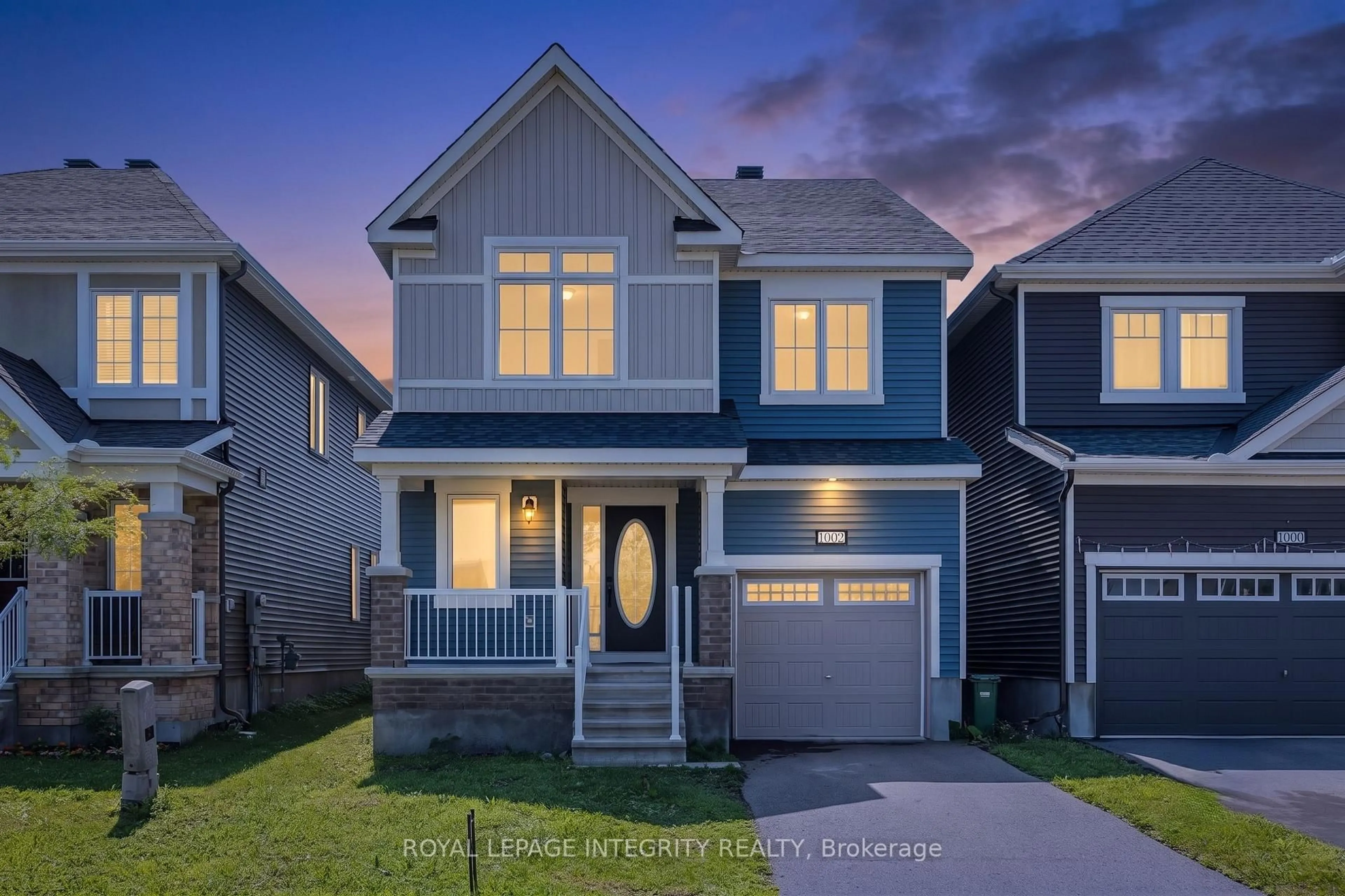 Home with vinyl exterior material, street for 1002 Laburnum Walk, Ottawa Ontario K2V 0N4
