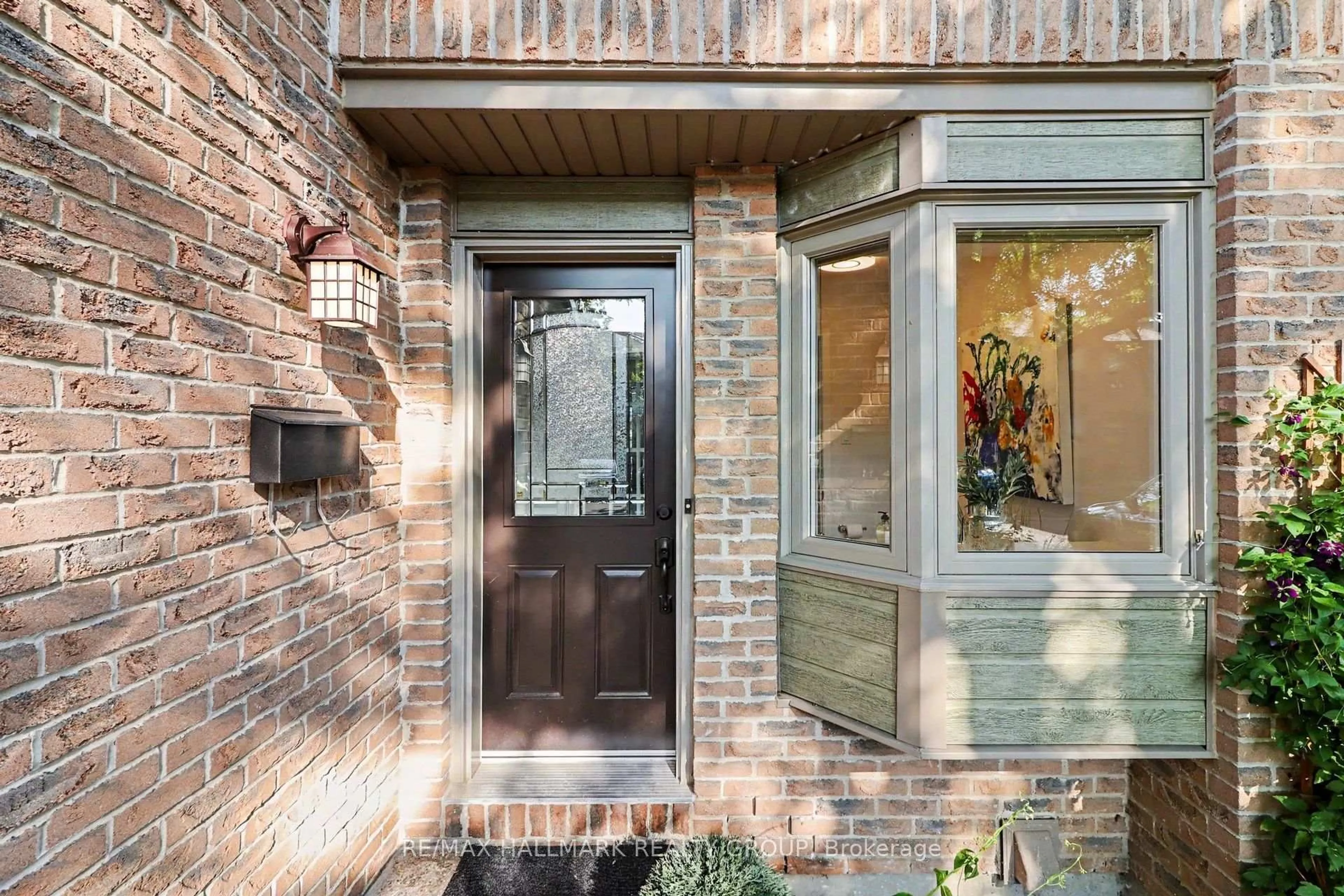 Home with brick exterior material, street for 710 Coronation Ave #63, Ottawa Ontario K1G 4G7