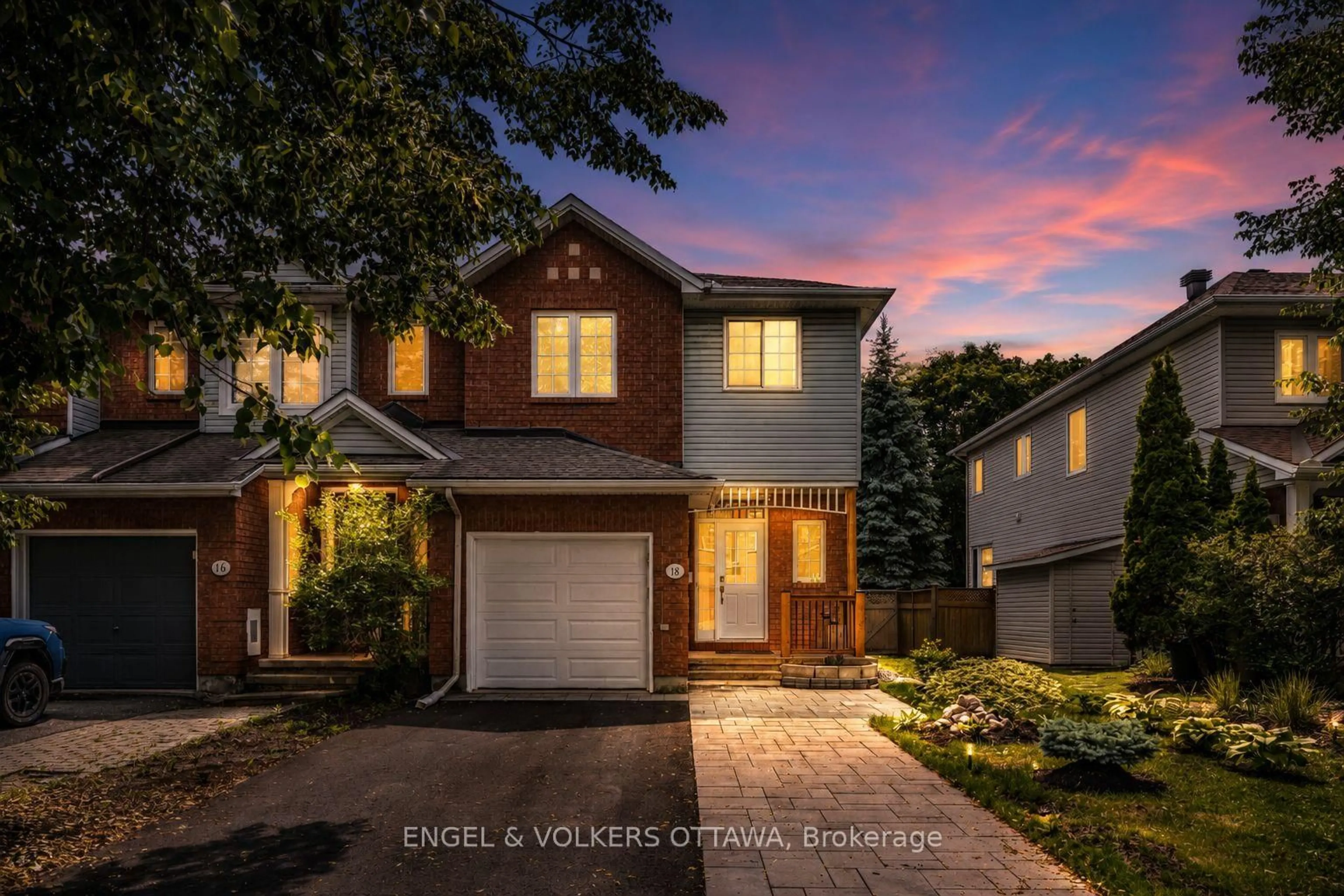 Home with brick exterior material, street for 18 Cambray Lane, Ottawa Ontario K2K 3C3