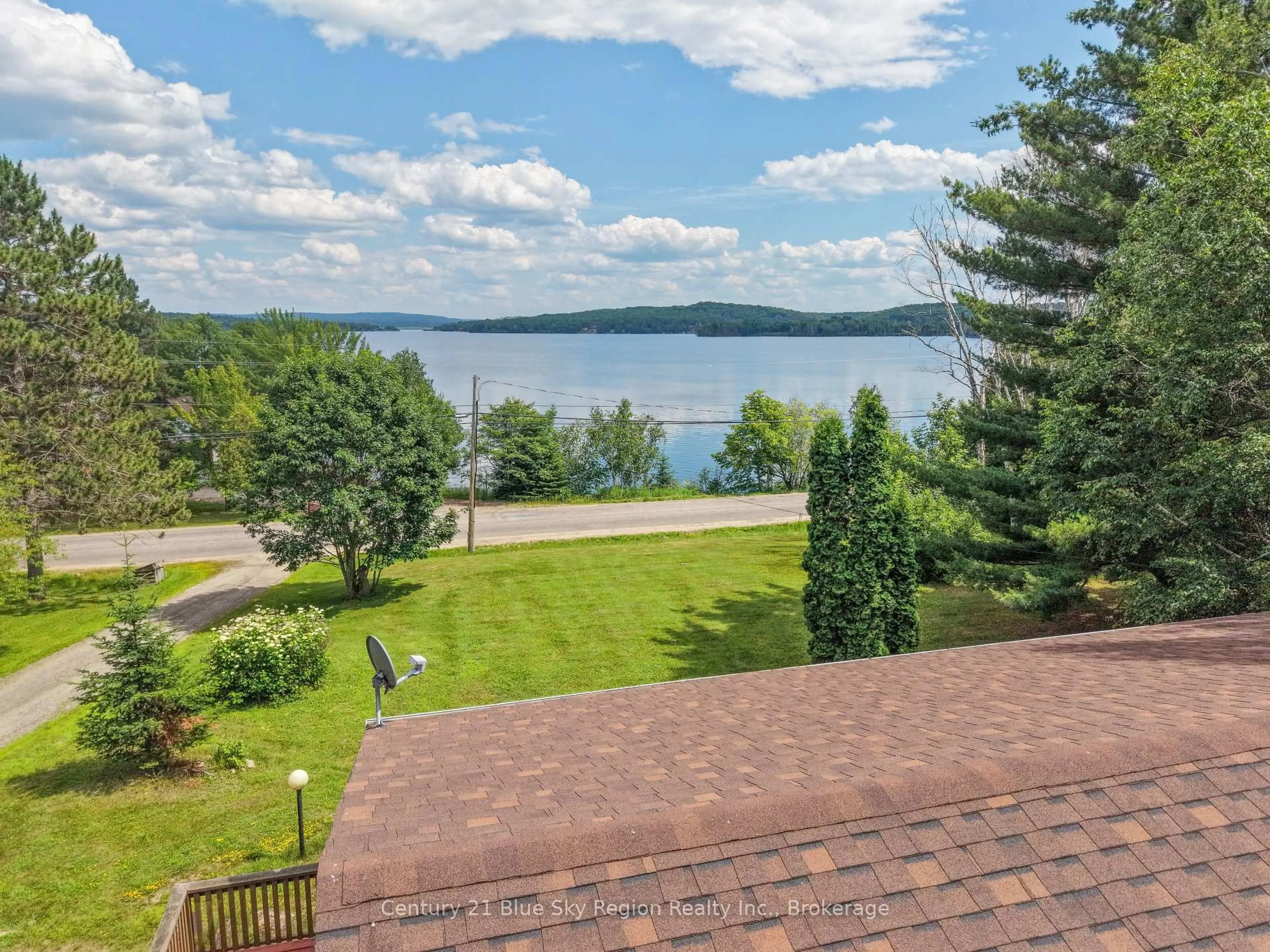 A pic from outside/outdoor area/front of a property/back of a property/a pic from drone, water/lake/river/ocean view for 47 Big Moose Rd, East Ferris Ontario P0H 1K0